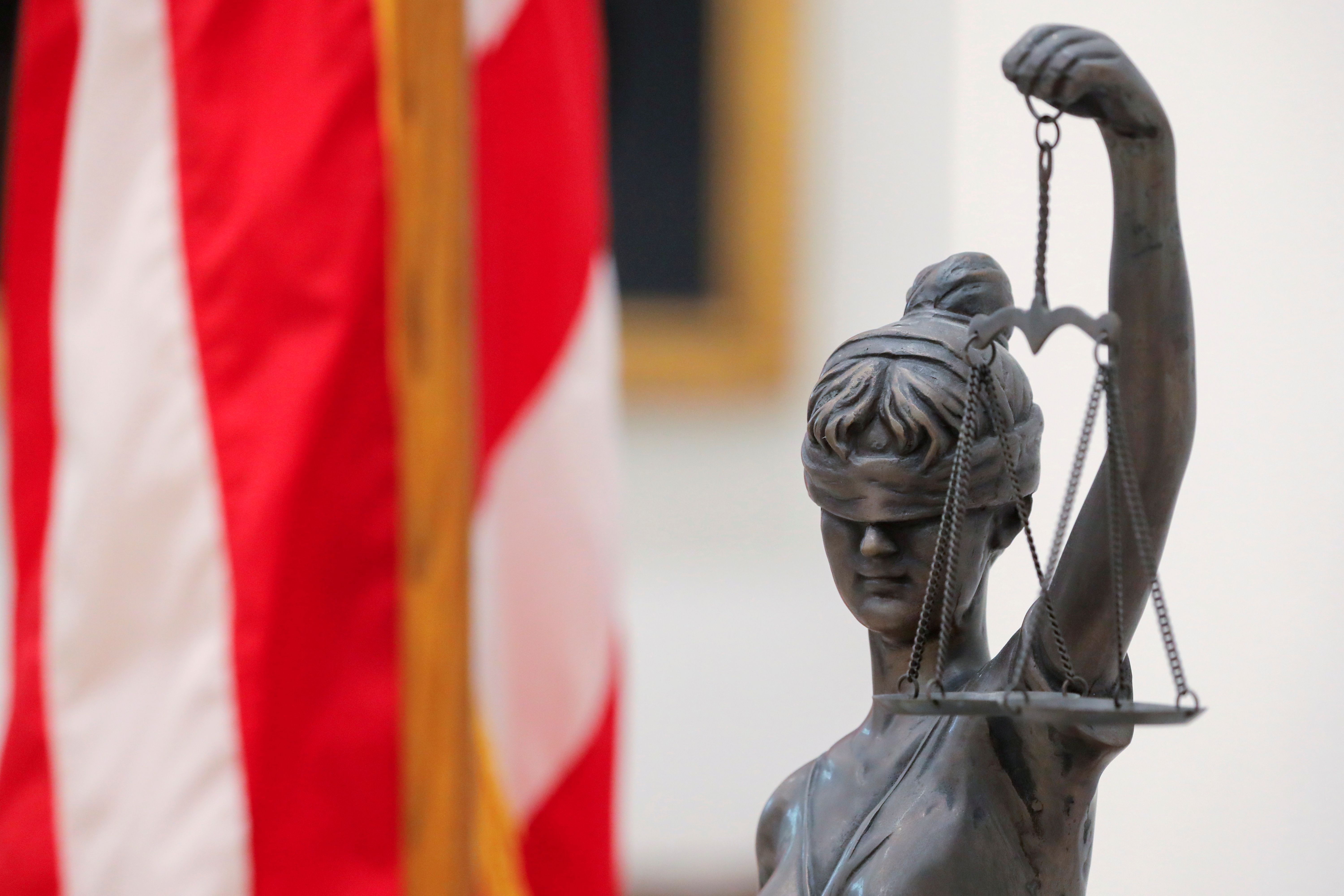 A Lady Justice statue is seen as we look at a multi-state crackdown on Kalshi. 