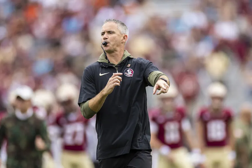 Head coach Mike Norvell of the Florida State Seminoles looks on as we dive into the latest 2024 ACC championship odds.