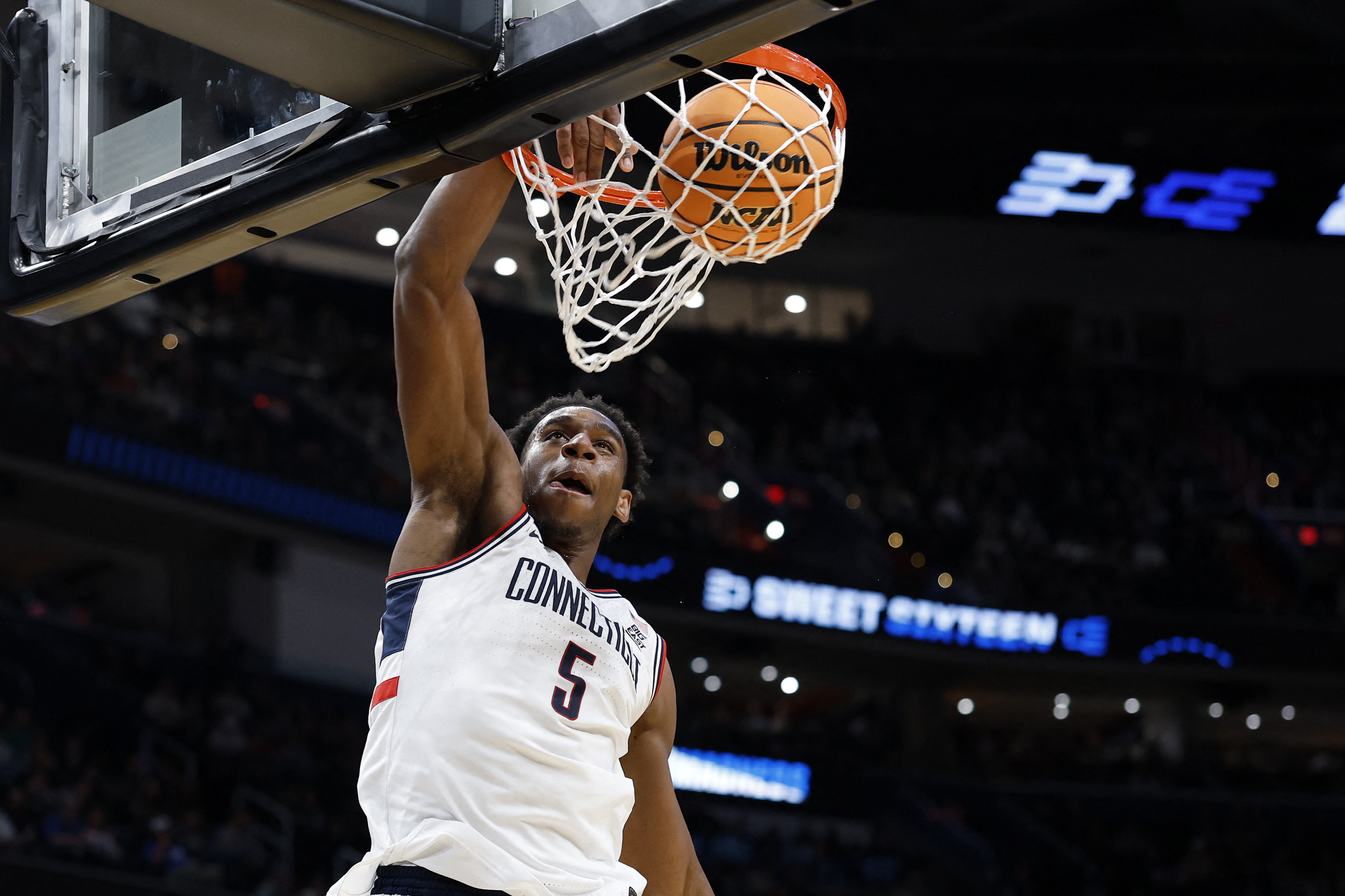Tarris Reed Jr. leads UConn against Duke in one of two games in our March Madness predictions for Sunday. 
