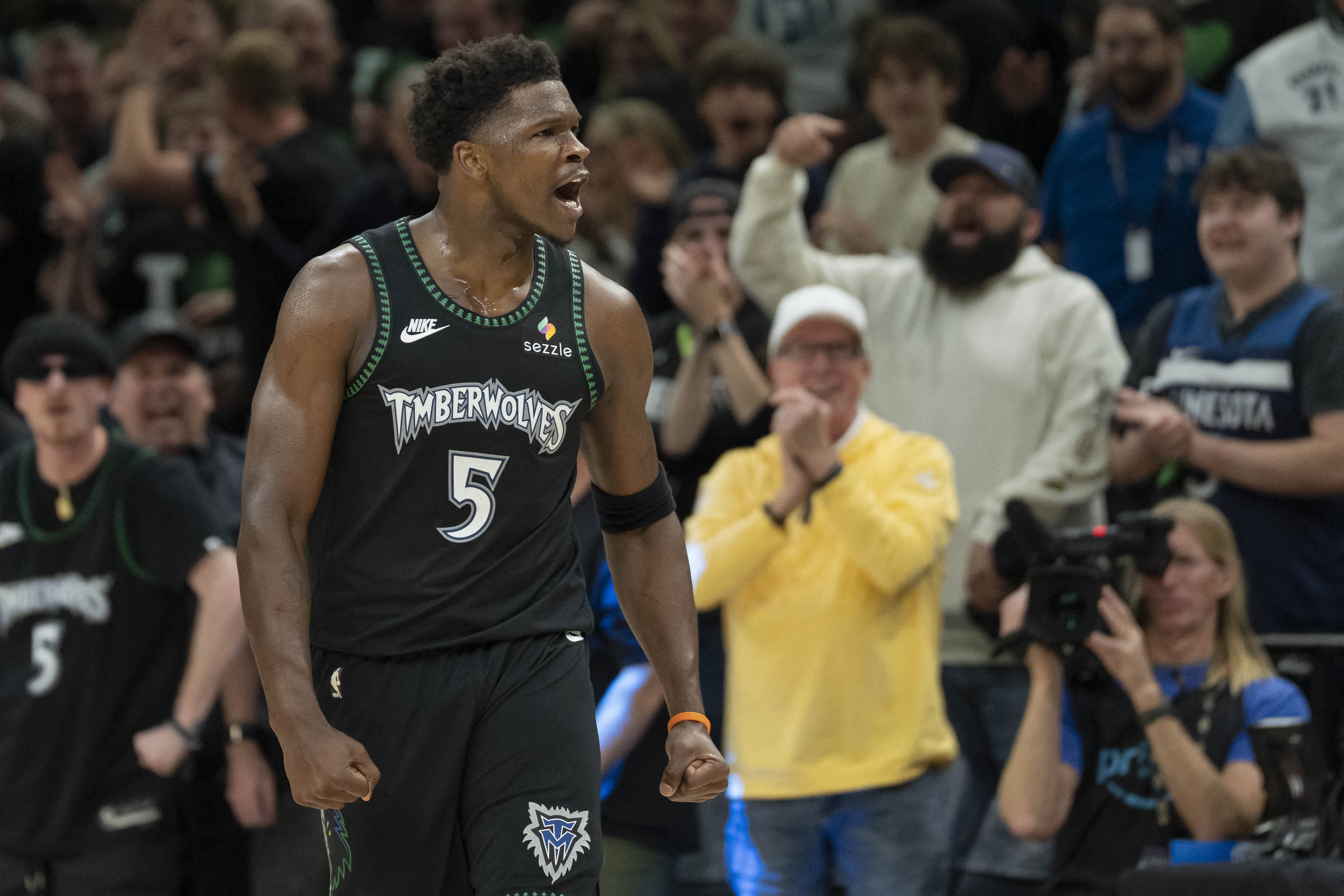 Minnesota Timberwolves guard Anthony Edwards (5) celebrates as we break down our NBA Play of the Day.