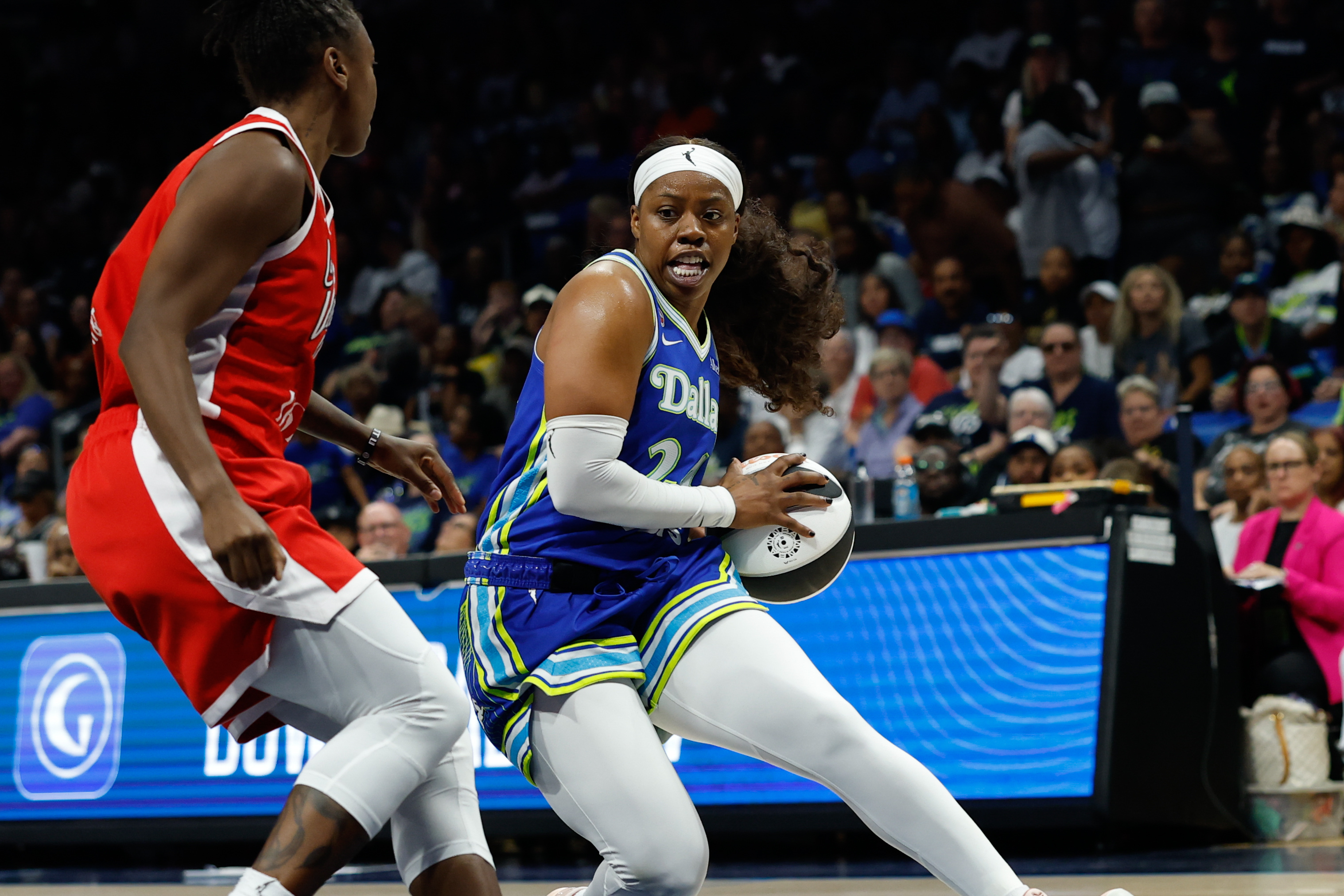 Dallas Wings guard Arike Ogunbowale (24) drives to the basket as we break down our Sky vs. Wings prediction.