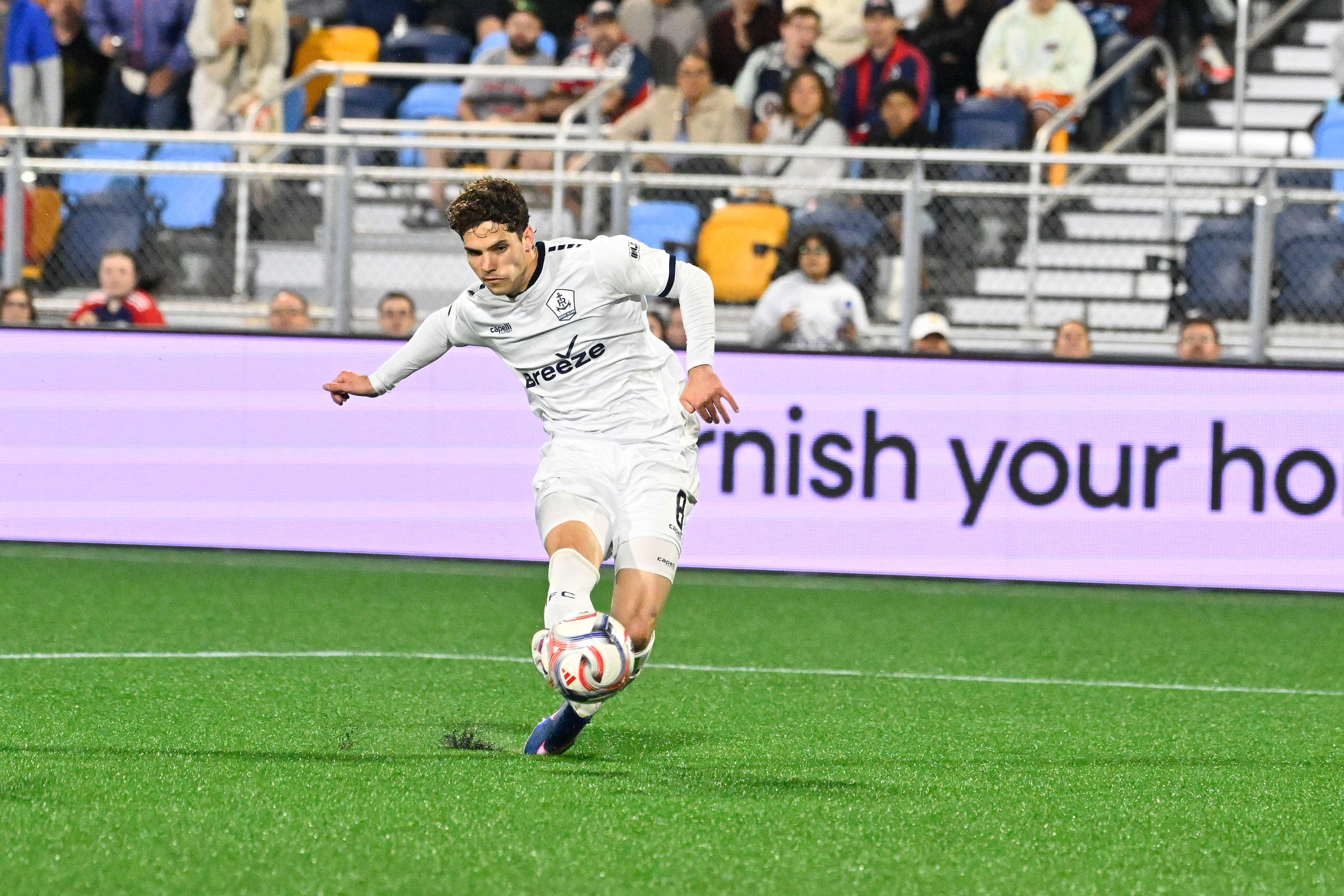Rhode Island FC forward Leo Afonso shoots the ball as we look at pressure in the state to introduce additional sports betting operators