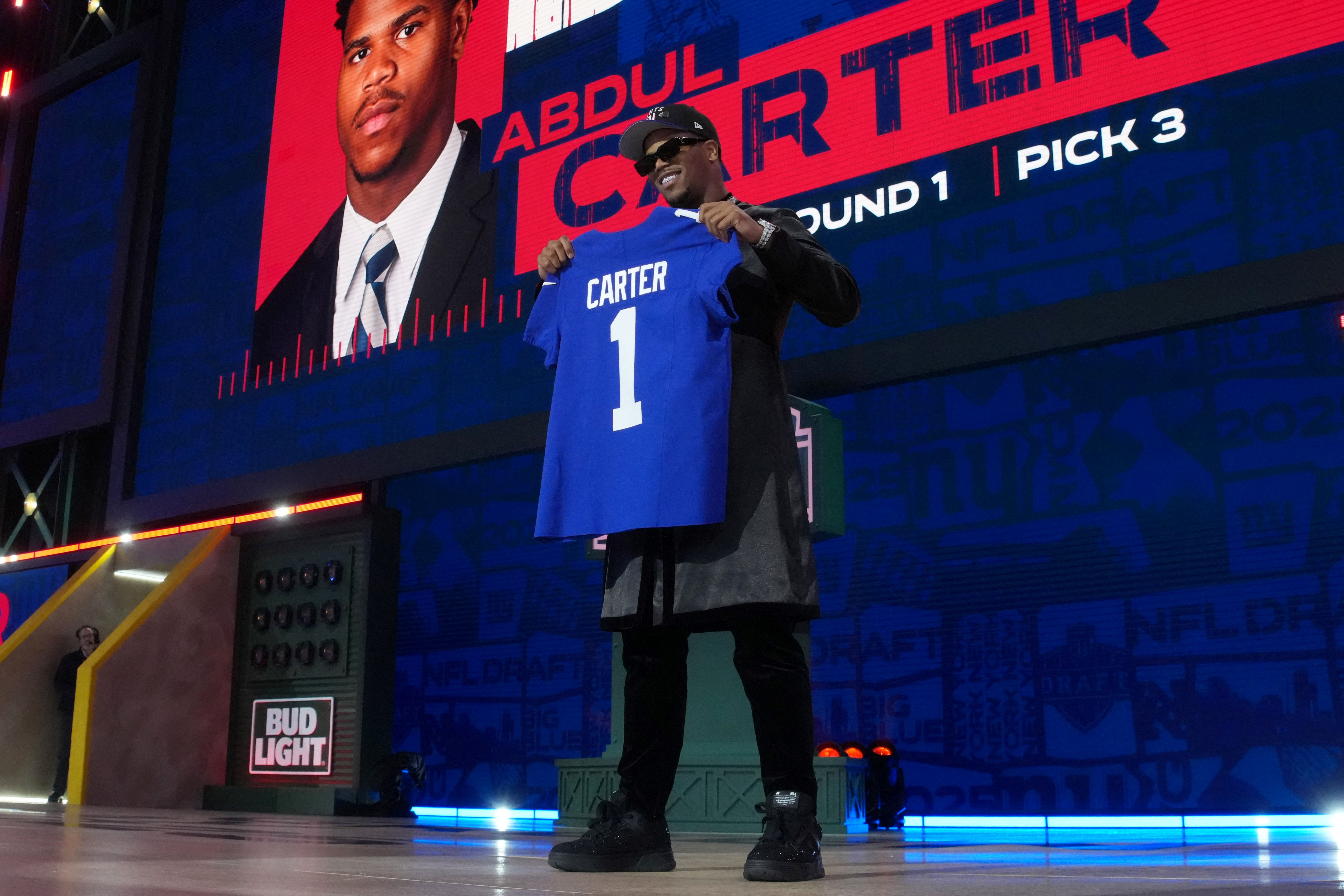 Penn State Nittany Lions defensive end Abdul Carter is selected by the New York Giants as the number three pick in the first round of the 2025 NFL Draft at Lambeau Field.