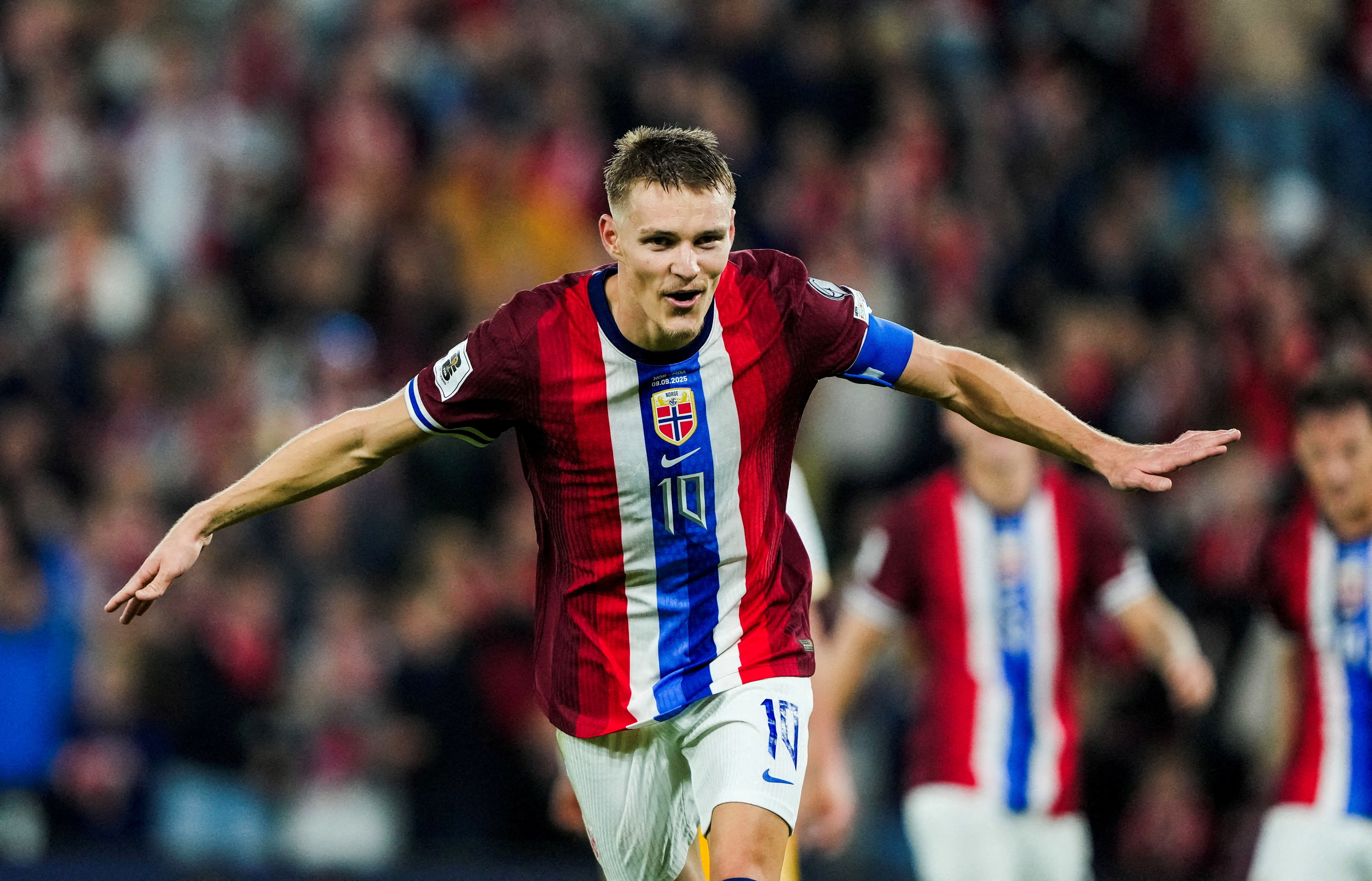 Norway's Martin Odegaard celebrates scoring as we make our best World Cup predictions today.
