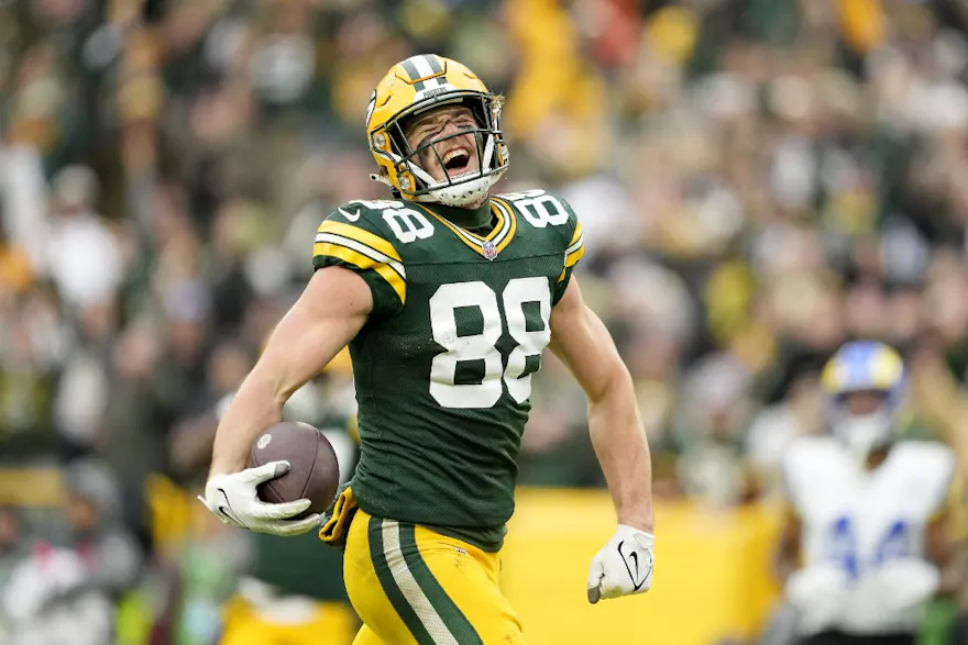 Luke Musgrave of the Green Bay Packers reacts after scoring a touchdown in the fourth quarter of a game against the Los Angeles Rams as we look at our Packers-49ers prediction.