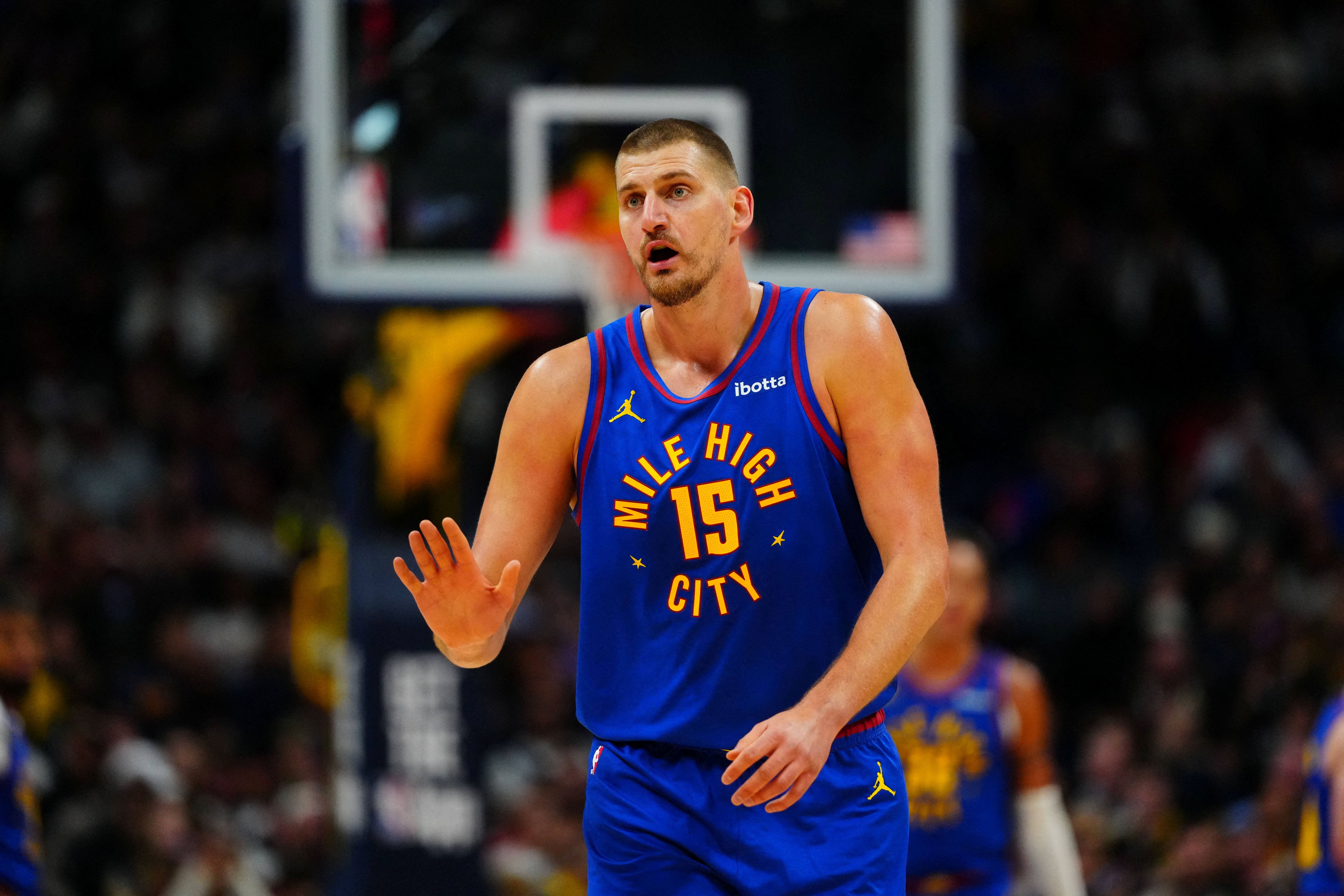 Denver Nuggets center Nikola Jokic (15) reacts as we break down our NBA best bets today.