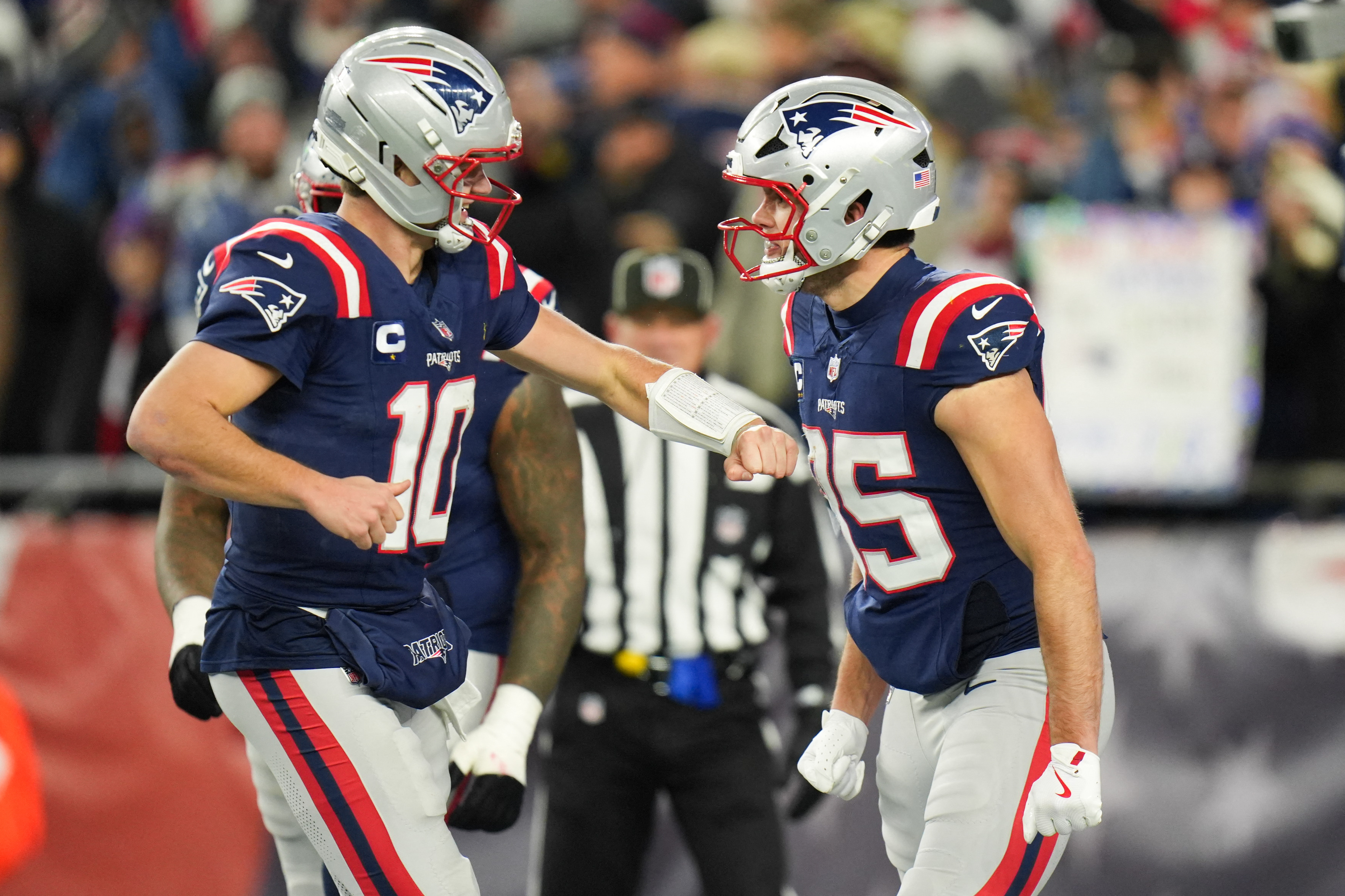 Drake Maye after scoring a touchdown as we offer our Texans vs. Patriots prediction.