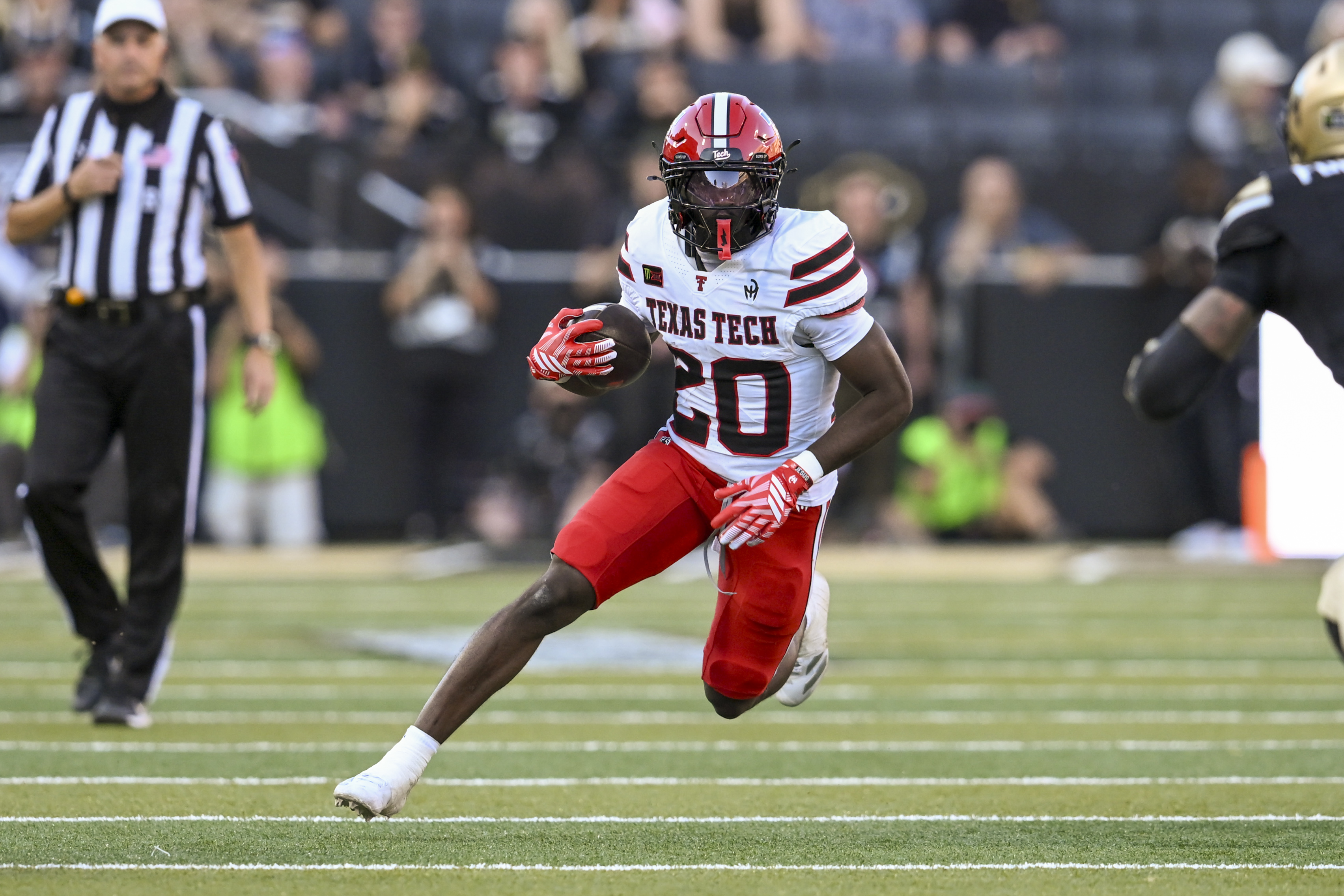Texas Tech RB J'Koby Williams runs with the ball as we make our best Arizona vs. Texas Tech same-game parlay. 