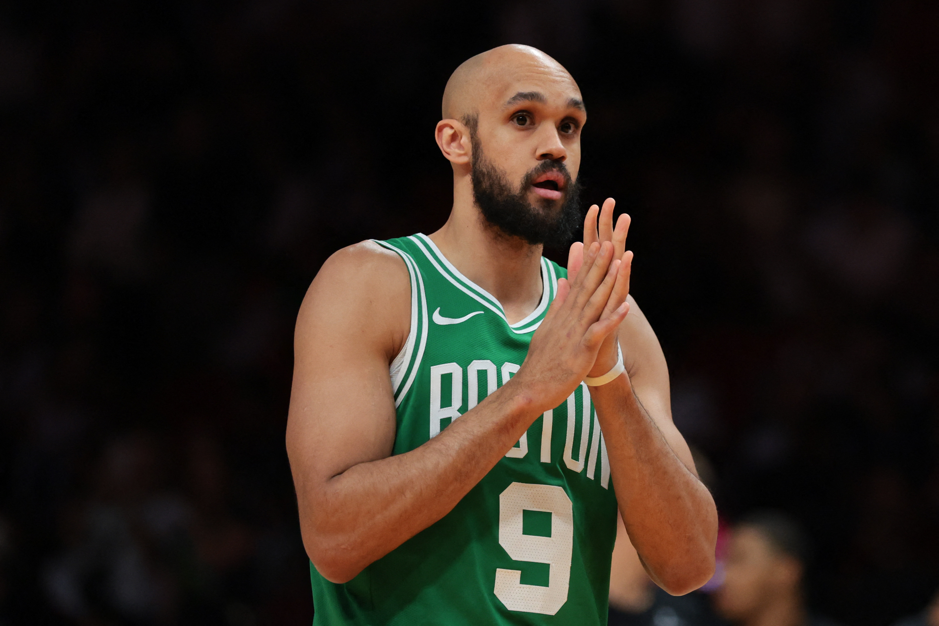Boston Celtics guard Derrick White (9), seen here looking on before a game, is featured in our Celtics vs. 76ers player props for Game 3 today.