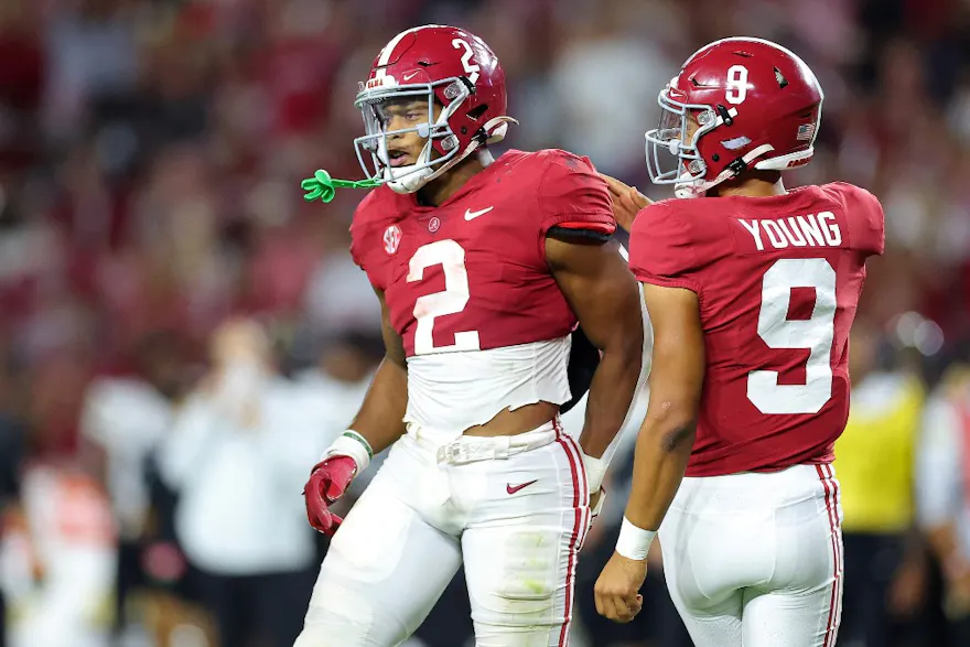 Bryce Young #9 and Jase McClellan #2 of the Alabama Crimson Tide celebrate a touchdown against the Vanderbilt Commodores during the second half of the game at Bryant-Denny Stadium on Sept. 24.