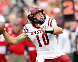 Diego Pavia of the New Mexico State Aggies throws a pass as we share our top player props for Conference Championship Week.