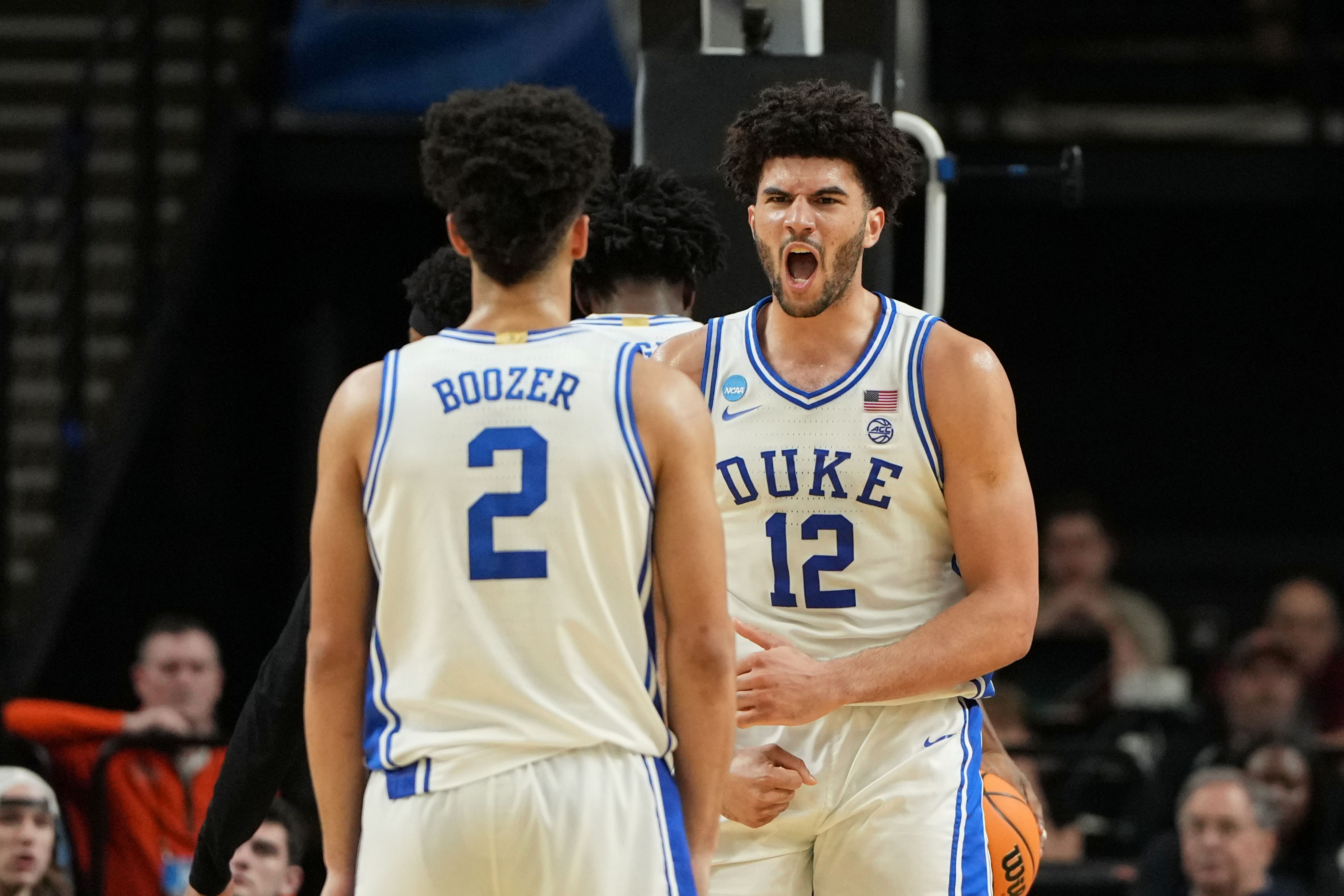 Duke Blue Devils forward Cameron Boozer reacts with guard Cayden Boozer, and the former is featured in our UConn vs. Duke player props.