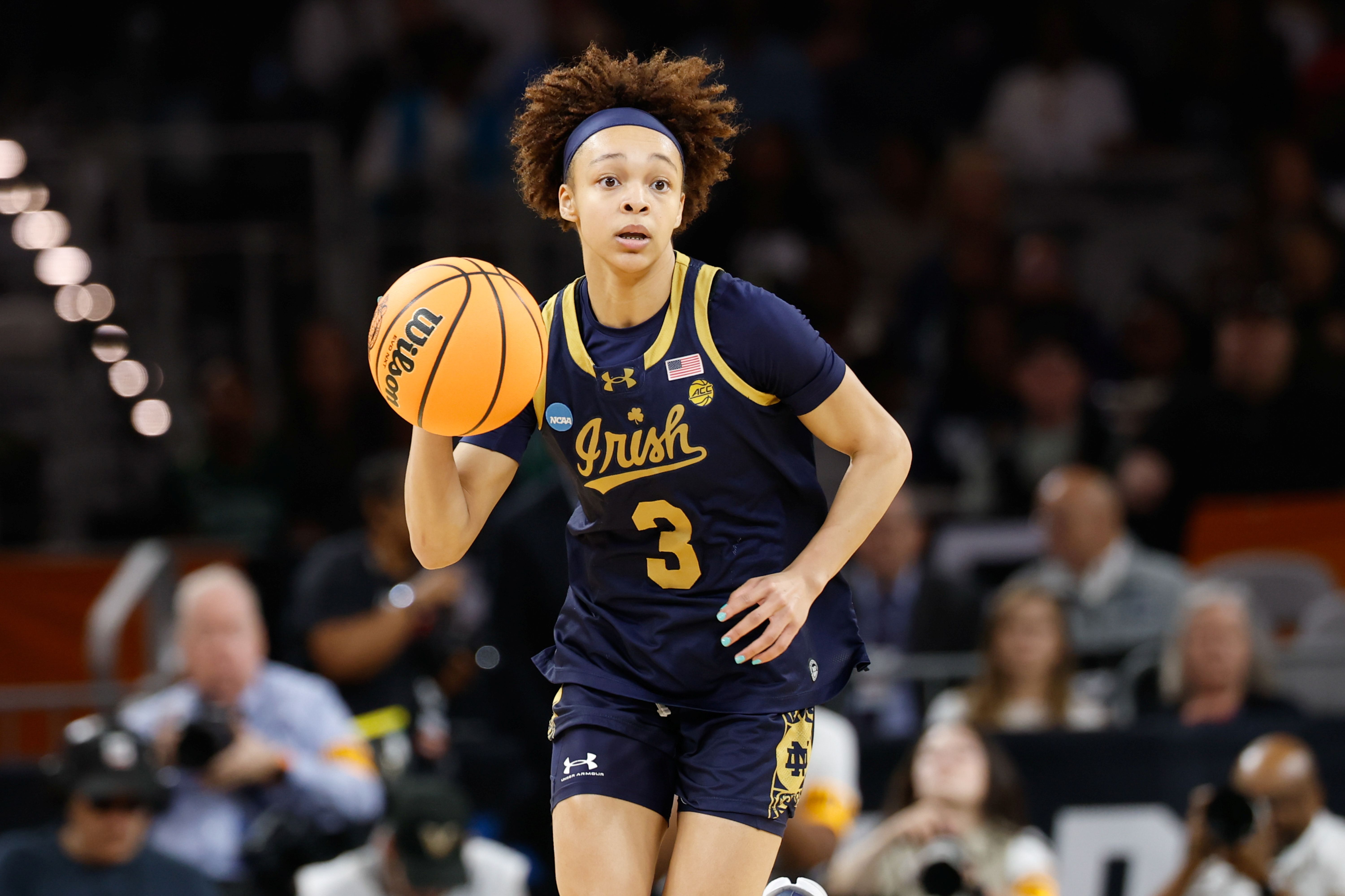 Notre Dame Fighting Irish guard Hannah Hidalgo dribbles, and she's central as we look at our Notre Dame vs. UConn prediction.