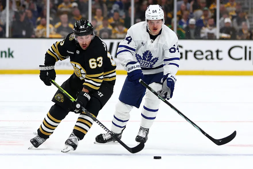 Brad Marchand skates against David Kampf during the first period of Game 5 as we dive into our expert prop picks for the pivotal Game 6 playoff contest featuring the Boston Bruins and Toronto Maple Leafs. 