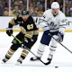 Brad Marchand skates against David Kampf during the first period of Game 5 as we dive into our expert prop picks for the pivotal Game 6 playoff contest featuring the Boston Bruins and Toronto Maple Leafs. 