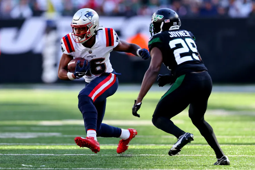 Jakobi Meyers of the New England Patriots runs with the ball as Lamarcus Joyner of the New York Jets defends at MetLife Stadium on Oct. 30, 2022 in East Rutherford, New Jersey. 
