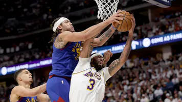 Aaron Gordon of the Denver Nuggets fights for a rebound against Anthony Davis of the Los Angeles Lakers, and we offer our top Nuggets vs. Lakers player props and expert picks based on the best NBA odds.