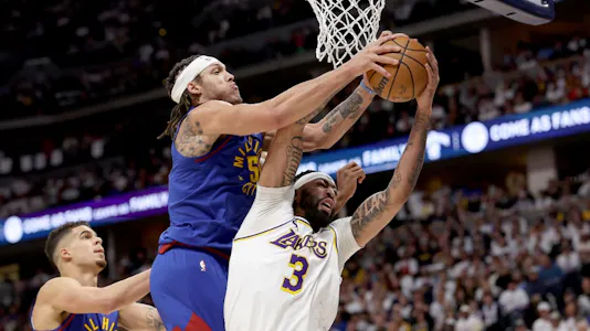 Aaron Gordon of the Denver Nuggets fights for a rebound against Anthony Davis of the Los Angeles Lakers, and we offer our top Nuggets vs. Lakers player props and expert picks based on the best NBA odds.