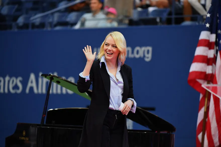 Actress Emma Stone arrives to introduce Billie Jean King before the start of the women's finals match during the US Open, and she headlines our top odds and predictions for the 2024 Oscars.