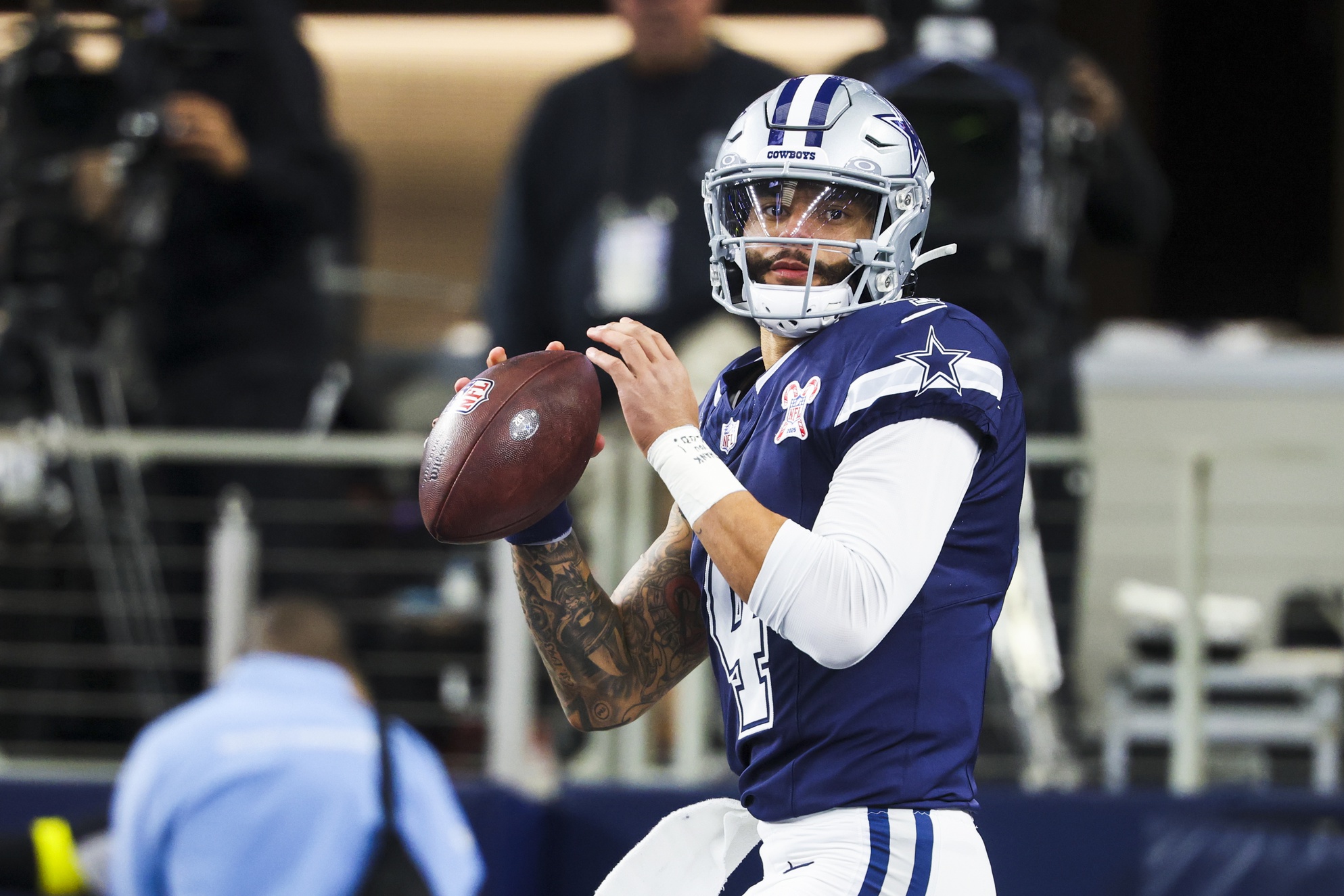 Dallas Cowboys quarterback Dak Prescott participates in pregame warmups, and he's key to our NFL player props for Christmas Day