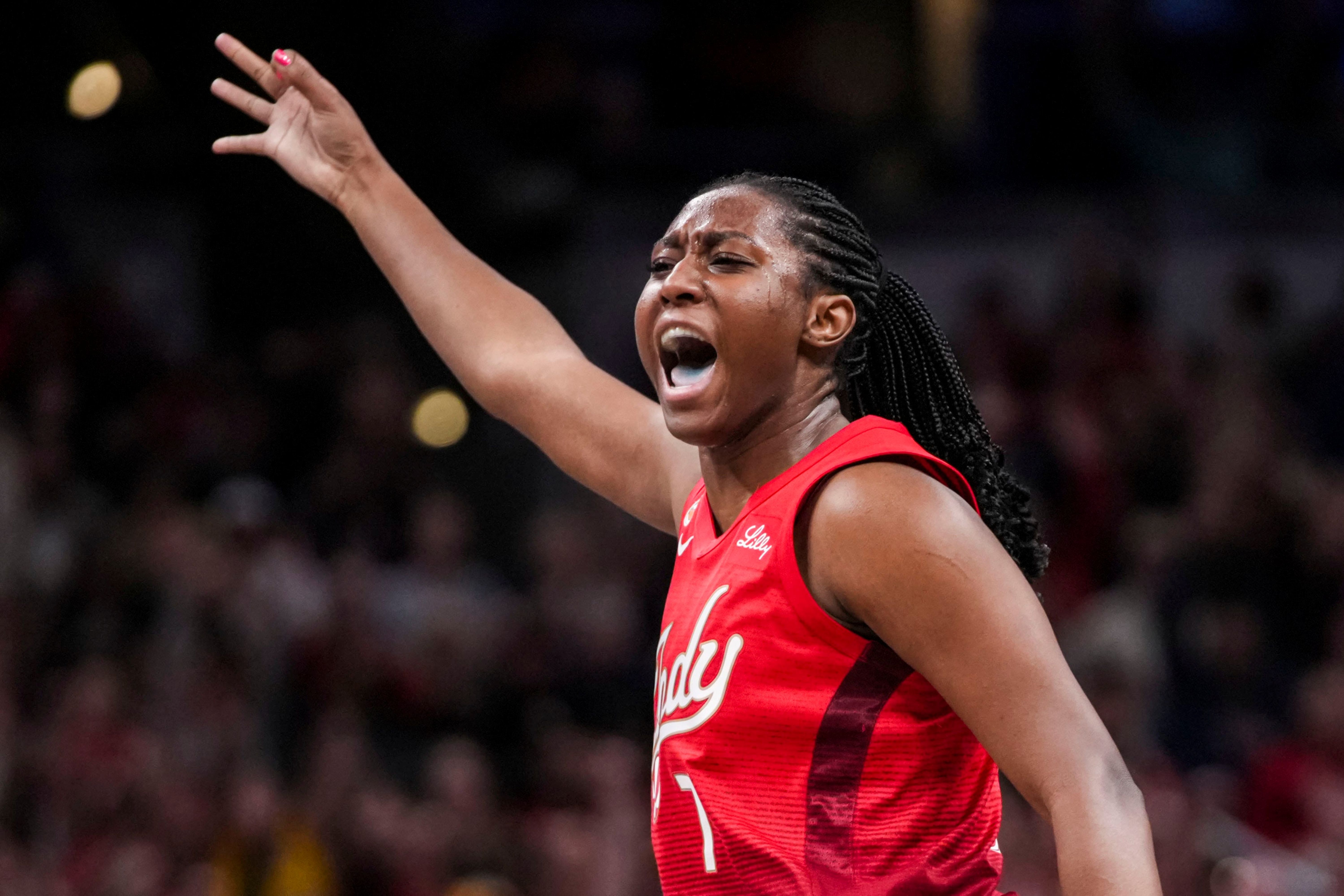 Indiana Fever center Aliyah Boston celebrates a 3-pointer, and she's key to my Sky vs. Fever prediction.