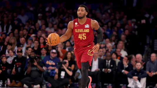Pictured: Cleveland Cavaliers guard Donovan Mitchell (45) brings the ball up the court as we provide our Cavaliers vs. Nets player props.