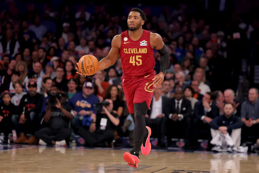 Pictured: Cleveland Cavaliers guard Donovan Mitchell (45) brings the ball up the court as we provide our Cavaliers vs. Nets player props.