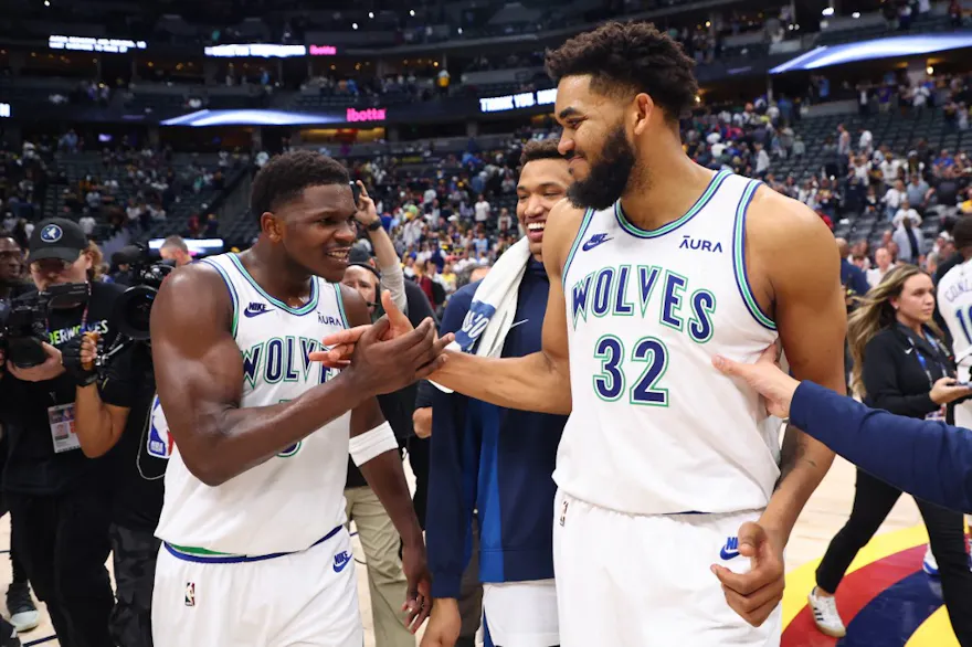 Anthony Edwards (5) and Karl-Anthony Towns (32) of the Minnesota Timberwolves celebrate as we offer our best Mavericks vs. Timberwolves player props for Game 1 of the Western Conference Finals at Target Center on Wednesday.