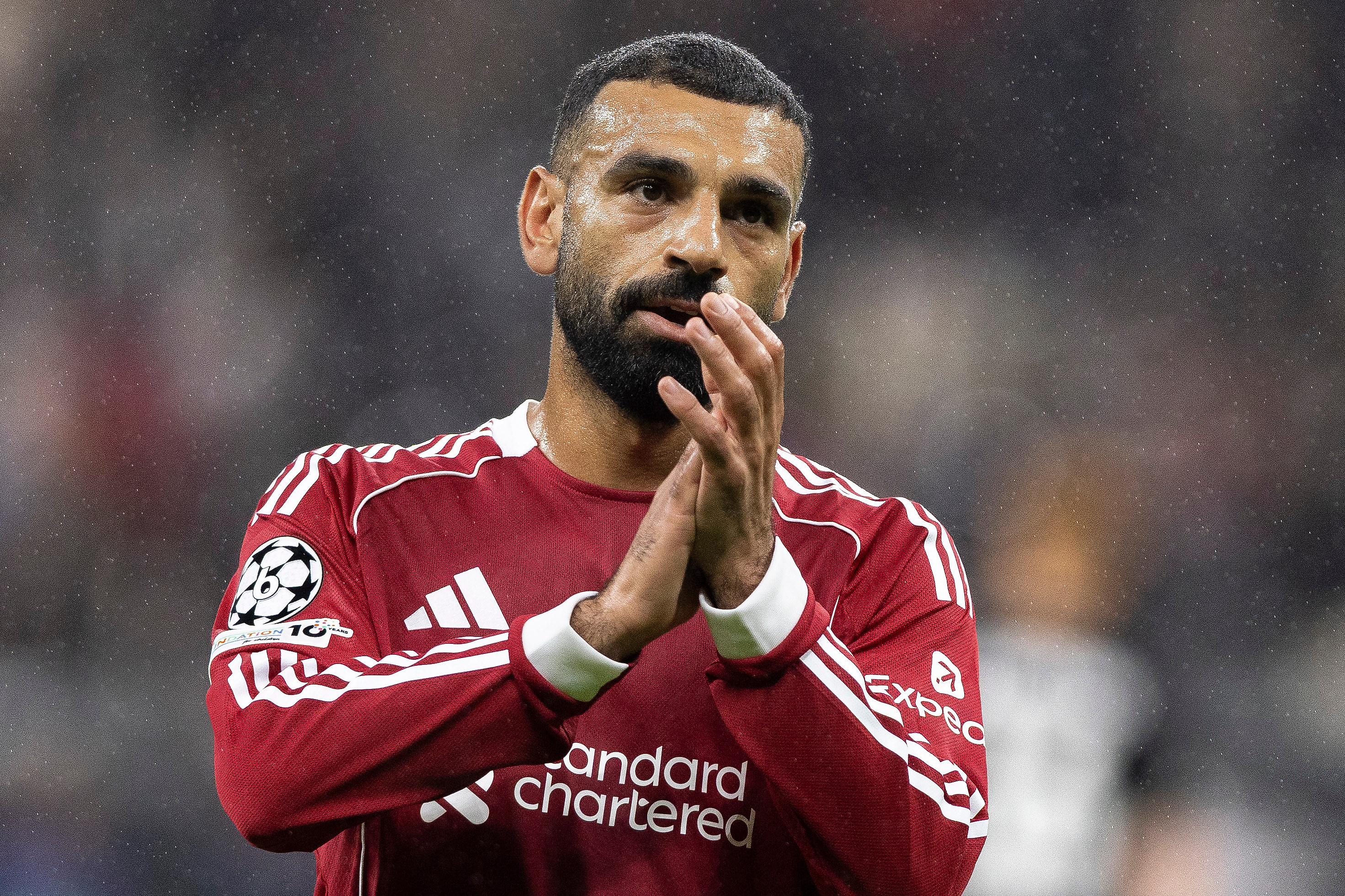 Liverpool's Mohamed Salah celebrates as we offer our Liverpool vs. Aston Villa prediction.