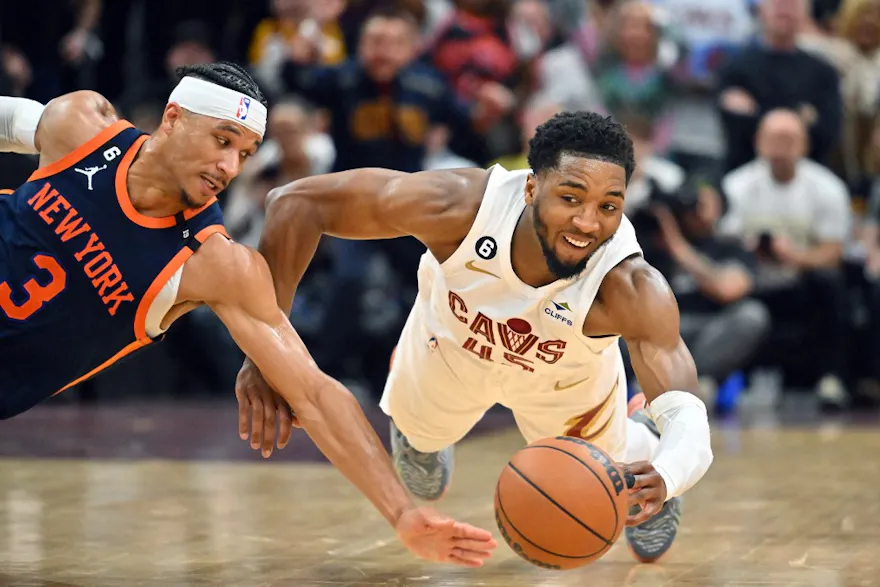 Donovan Mitchell of the Cleveland Cavaliers dives for a loose ball, and we offer new U.S. bettors our exclusive BetRivers bonus code.