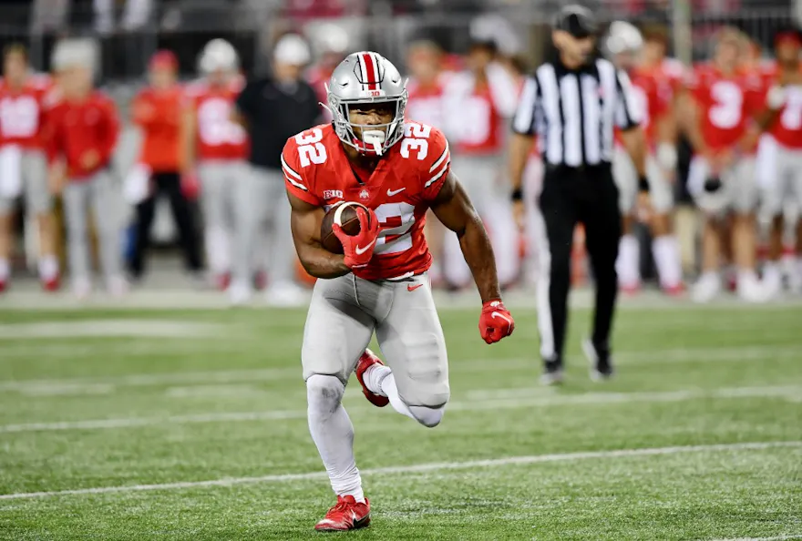 TreVeyon Henderson of the Ohio State Buckeyes runs the ball for a touchdown against the Akron Zips at Ohio Stadium on Sept. 25, 2021 in Columbus, Ohio.