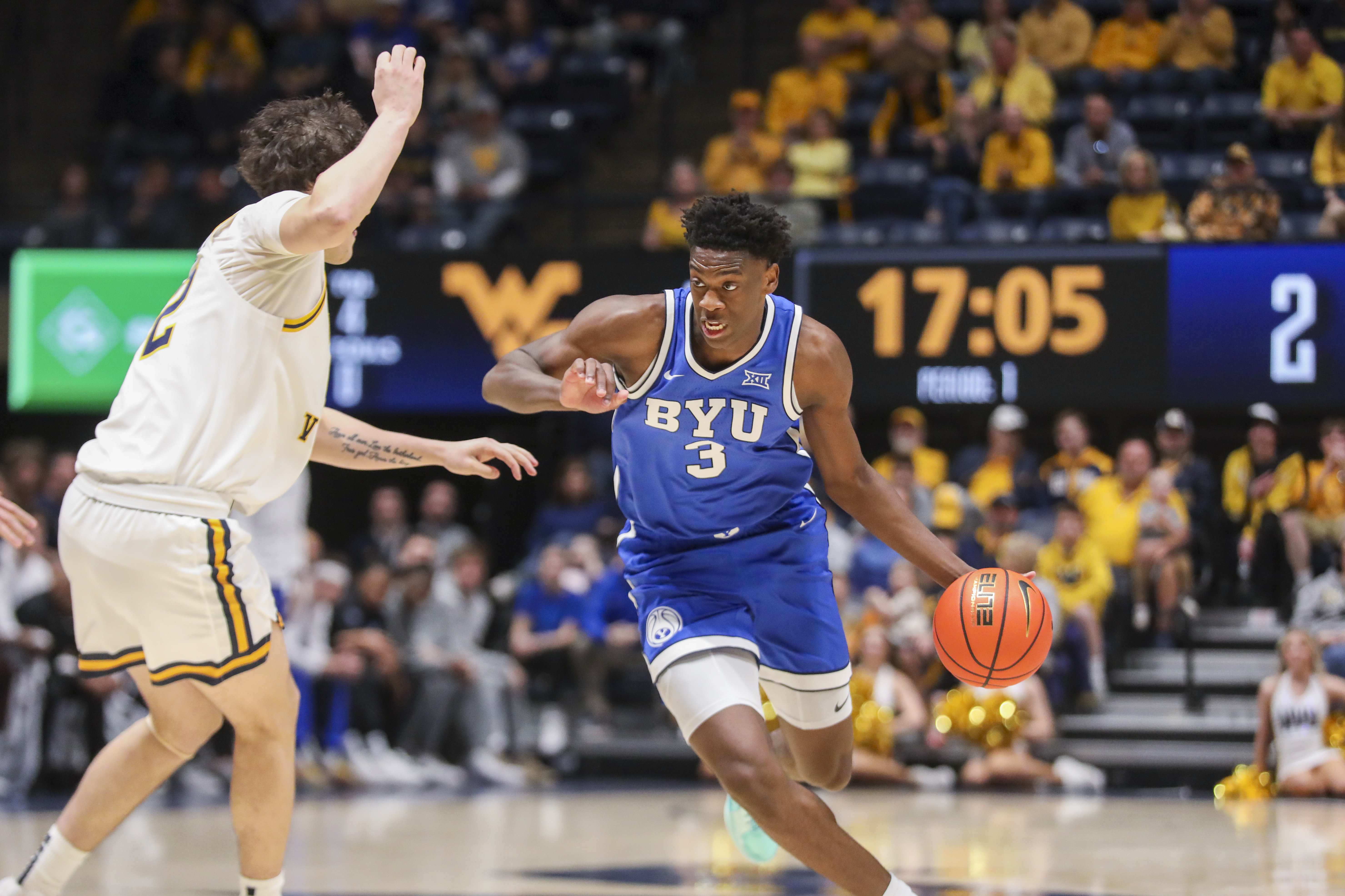 BYU forward AJ Dybantsa (3) dribbles against a defender as we look at our Texas Tech vs. BYU prediction