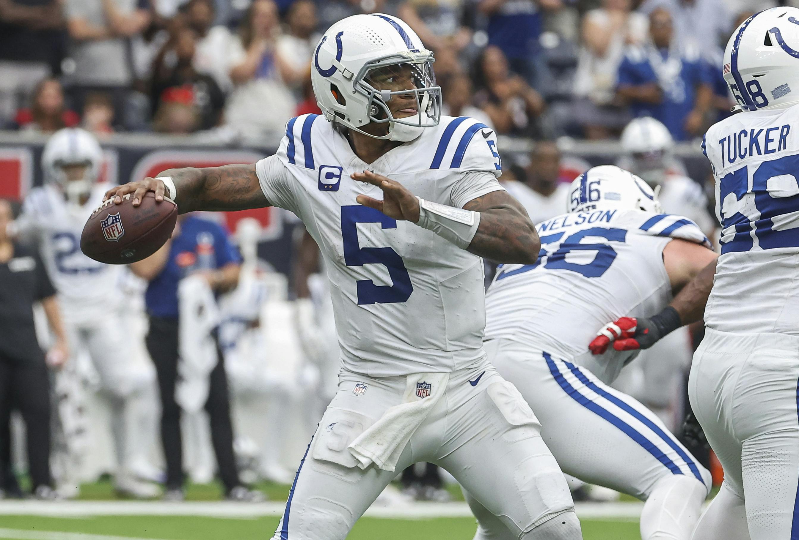 Indianapolis Colts quarterback Anthony Richardson looks for an open receiver as we offer our NFL Week 12 player prop bets and odds.