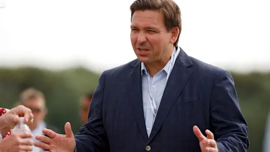 Florida governor Ron DeSantis meets with fans during Day One of The Walker Cup at Seminole Golf Club on May 08, 2021 in Juno Beach, Florida.