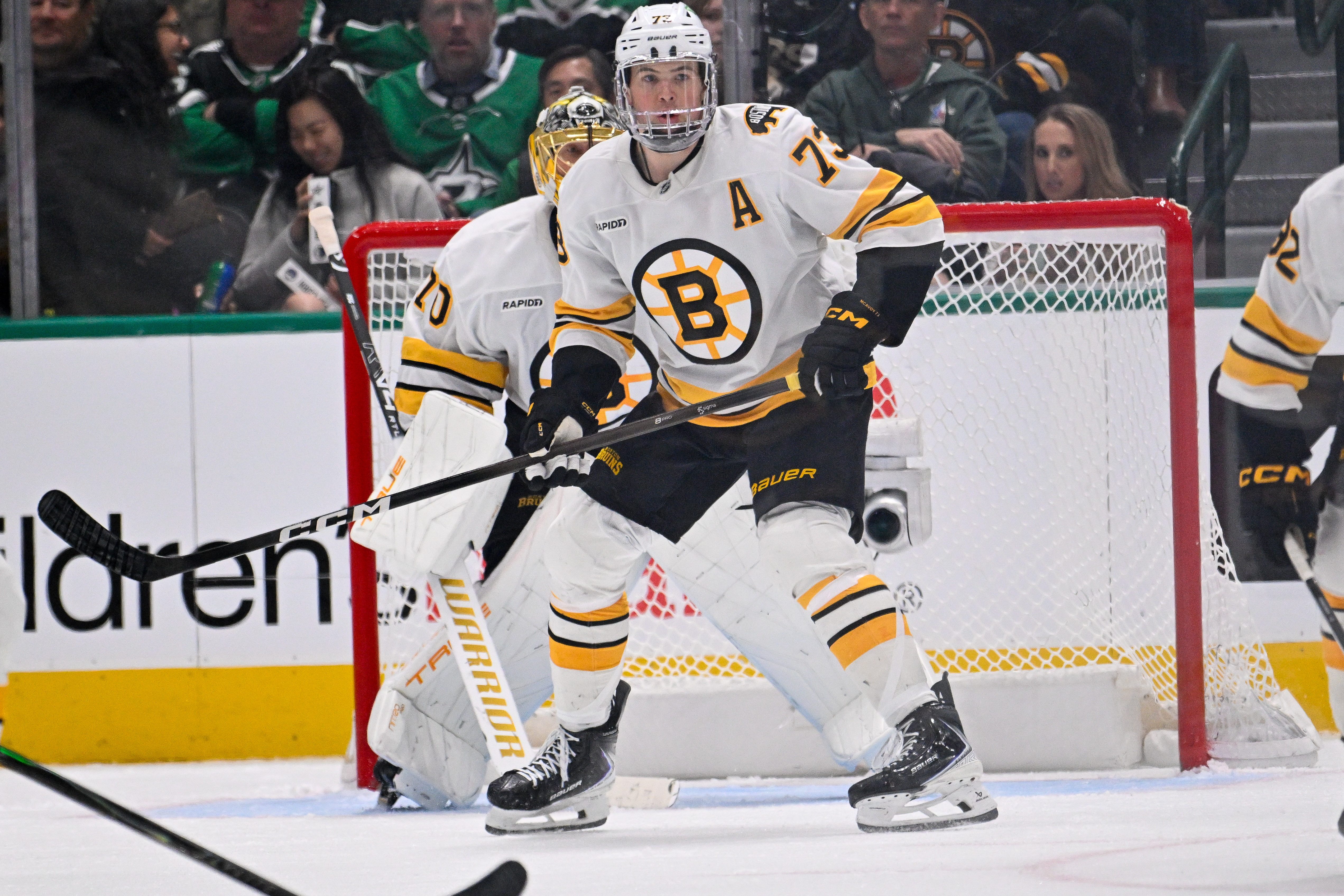  Boston Bruins defenseman Charlie McAvoy (73) defending as we break down our Bruins vs. Flyers prediction & odds.