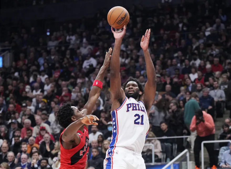 Joel Embiid of the Philadelphia 76ers shoots over O.G. Anunoby of the Toronto Raptors during the first half of their basketball game at the Scotiabank Arena. Here's our breakdown of Wednesday's FanDuel odds boost.