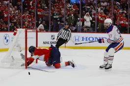 Florida Panthers forward Matthew Tkachuk reaches for the puck on an empty net attempt on goal by Edmonton Oilers forward Connor McDavid as we look at the best 2024 Stanley Cup odds.