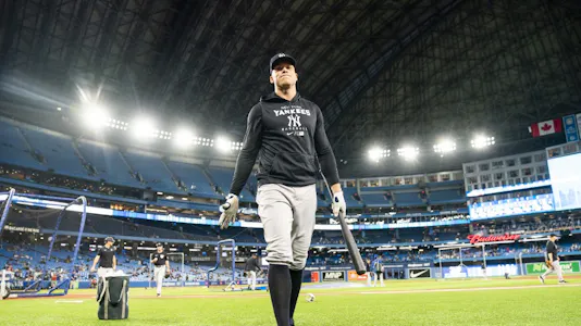 Aaron Judge #99 of the New York Yankees walks off the field after batting practice before playing the Toronto Blue Jays in their MLB game at the Rogers Centre on Sept. 26, 2022.  Mark Blinch/Getty Images/AFP.