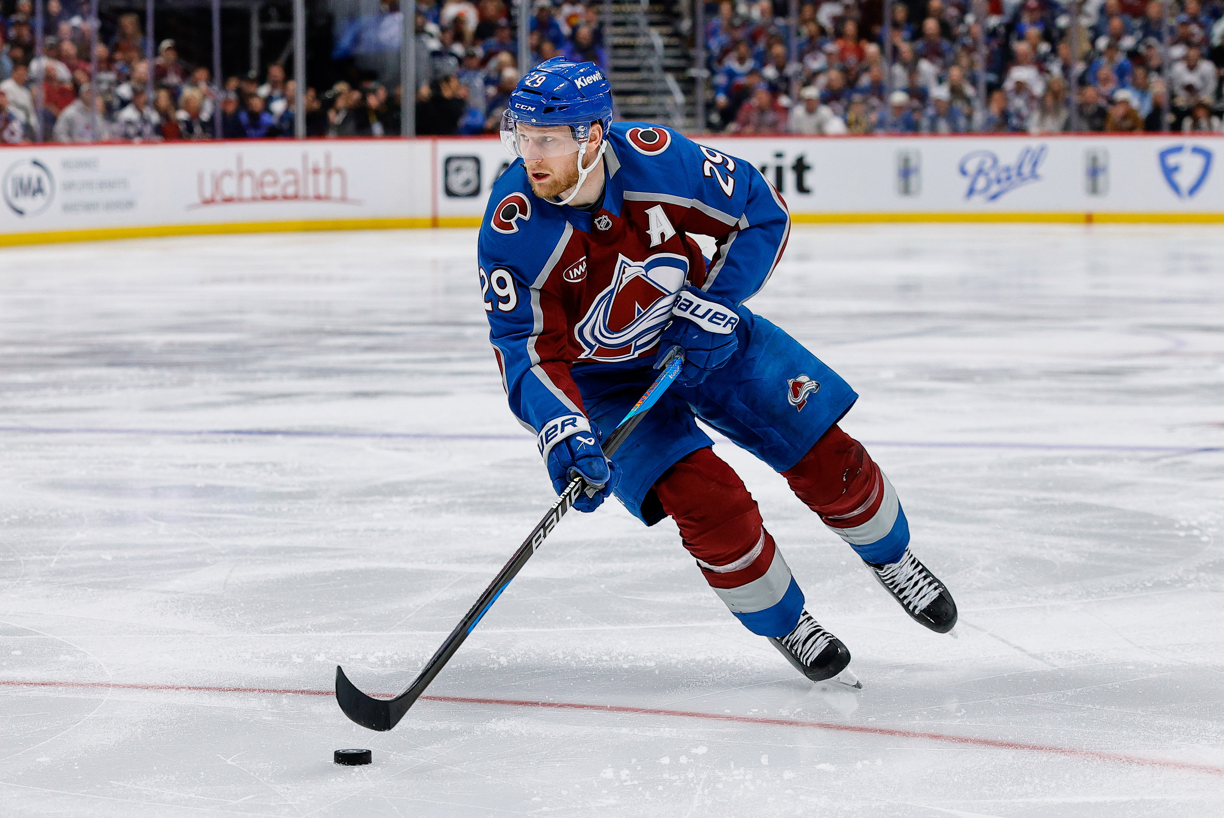 Colorado Avalanche center Nathan MacKinnon controls the puck as we make our Golden Knights vs. Avalanche prediction for Game 1.