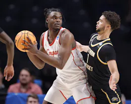 Jarace Walker of the Houston Cougars drives the lane against Trey Robinson of the Northern Kentucky Norse and we offer our top odds and predictions for the March Madness game between Miami and Houston.
