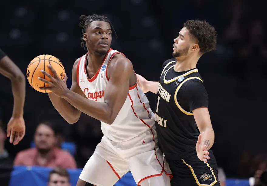 Jarace Walker of the Houston Cougars drives the lane against Trey Robinson of the Northern Kentucky Norse and we offer our top odds and predictions for the March Madness game between Miami and Houston.