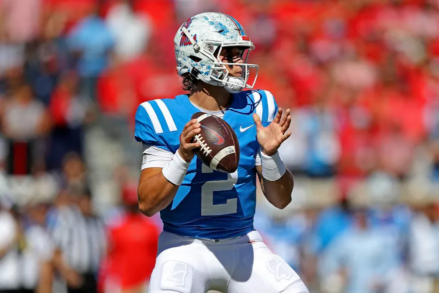 Jaxson Dart of the Mississippi Rebels looks to make a pass play during the first half against the Kentucky Wildcats.