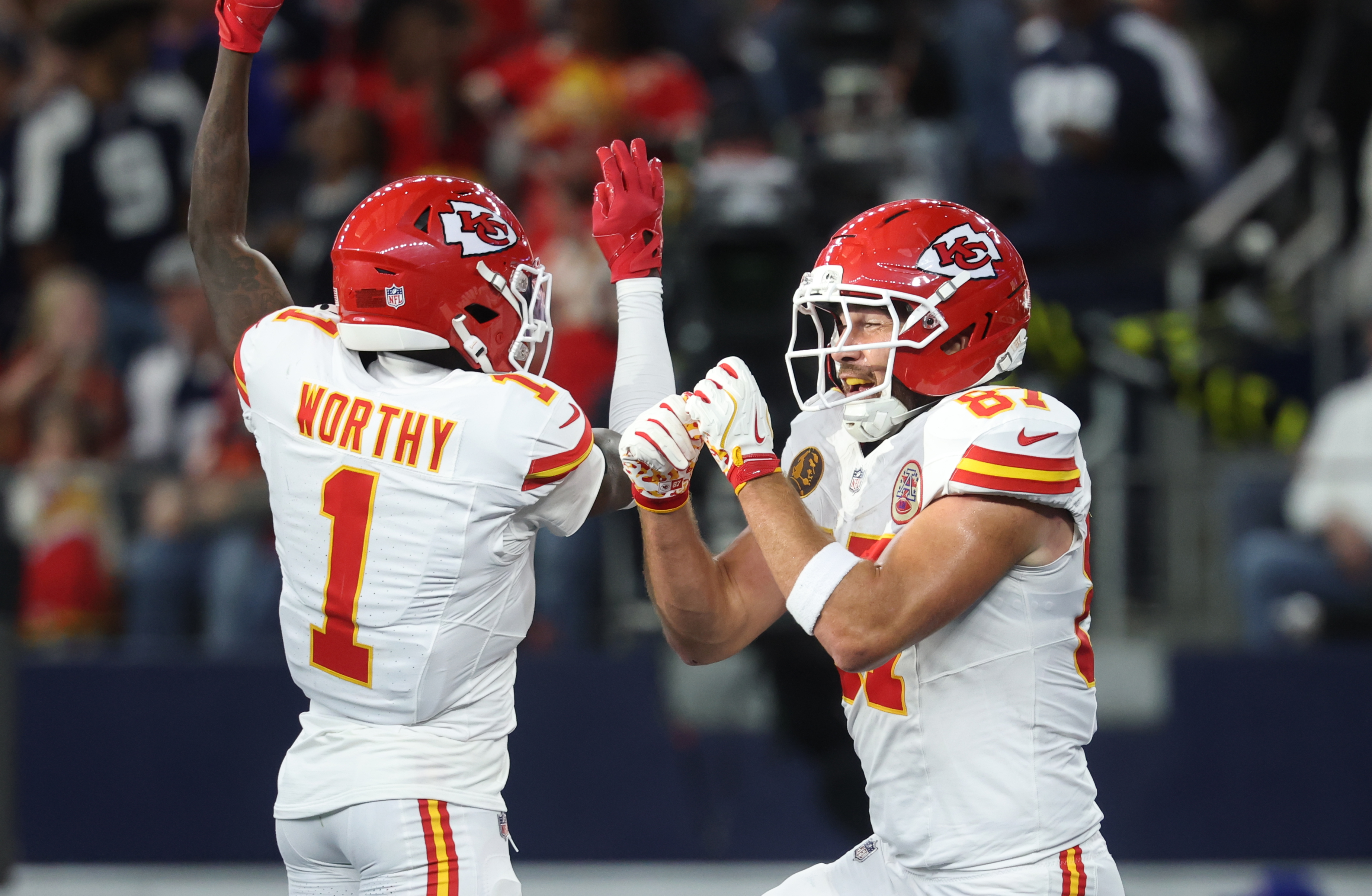 Kansas City Chiefs wide receiver Xavier Worthy and tight end Travis Kelce celebrate. 