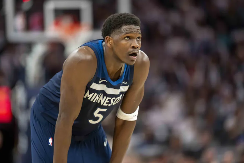 Minnesota Timberwolves guard Anthony Edwards looks on against the Toronto Raptors, and we offer our top Mavericks vs. Timberwolves NBA player prop bets.