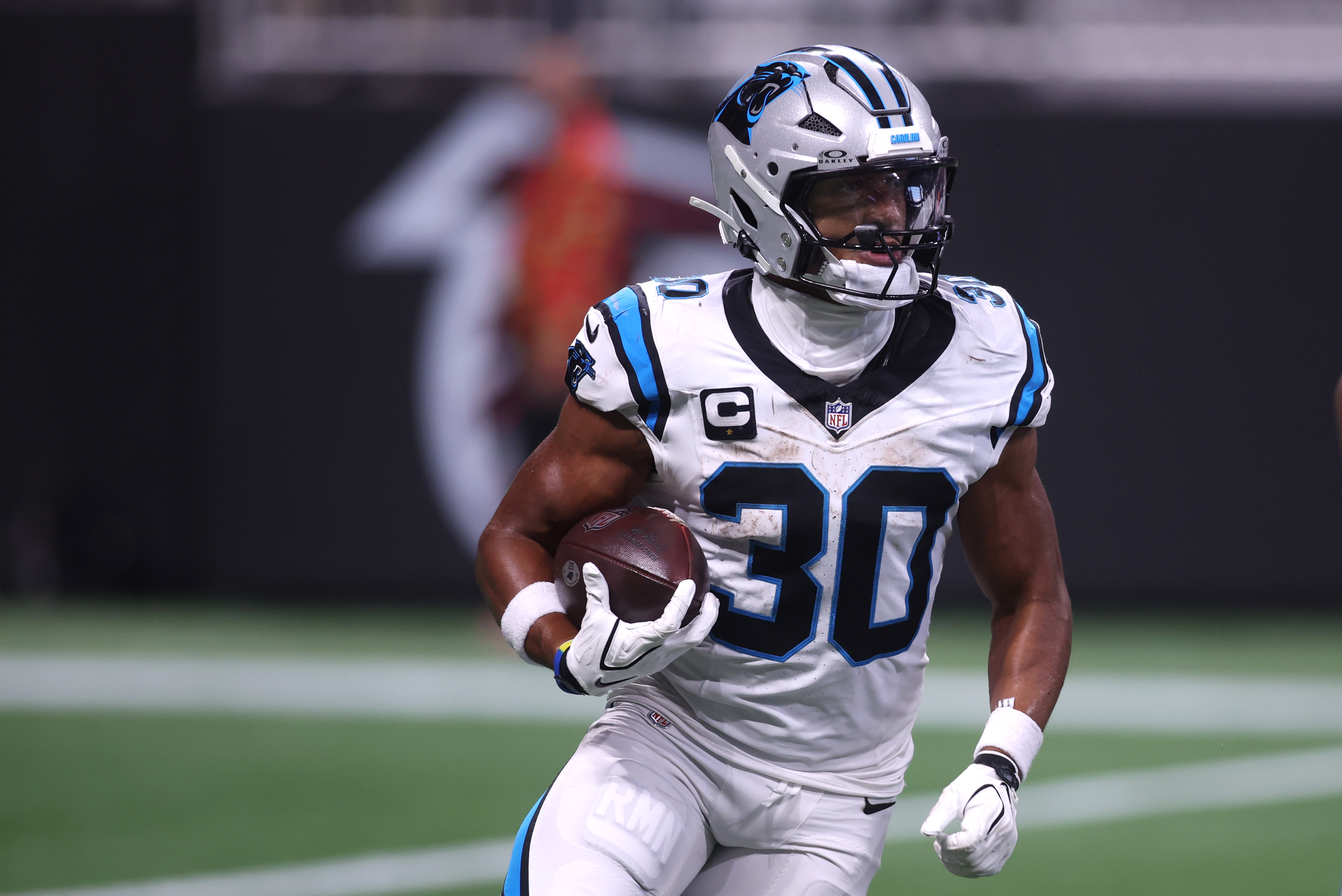 Carolina Panthers running back Chuba Hubbard (30) rushes as he is featured in our NFL 2+ touchdown scorer predictions.