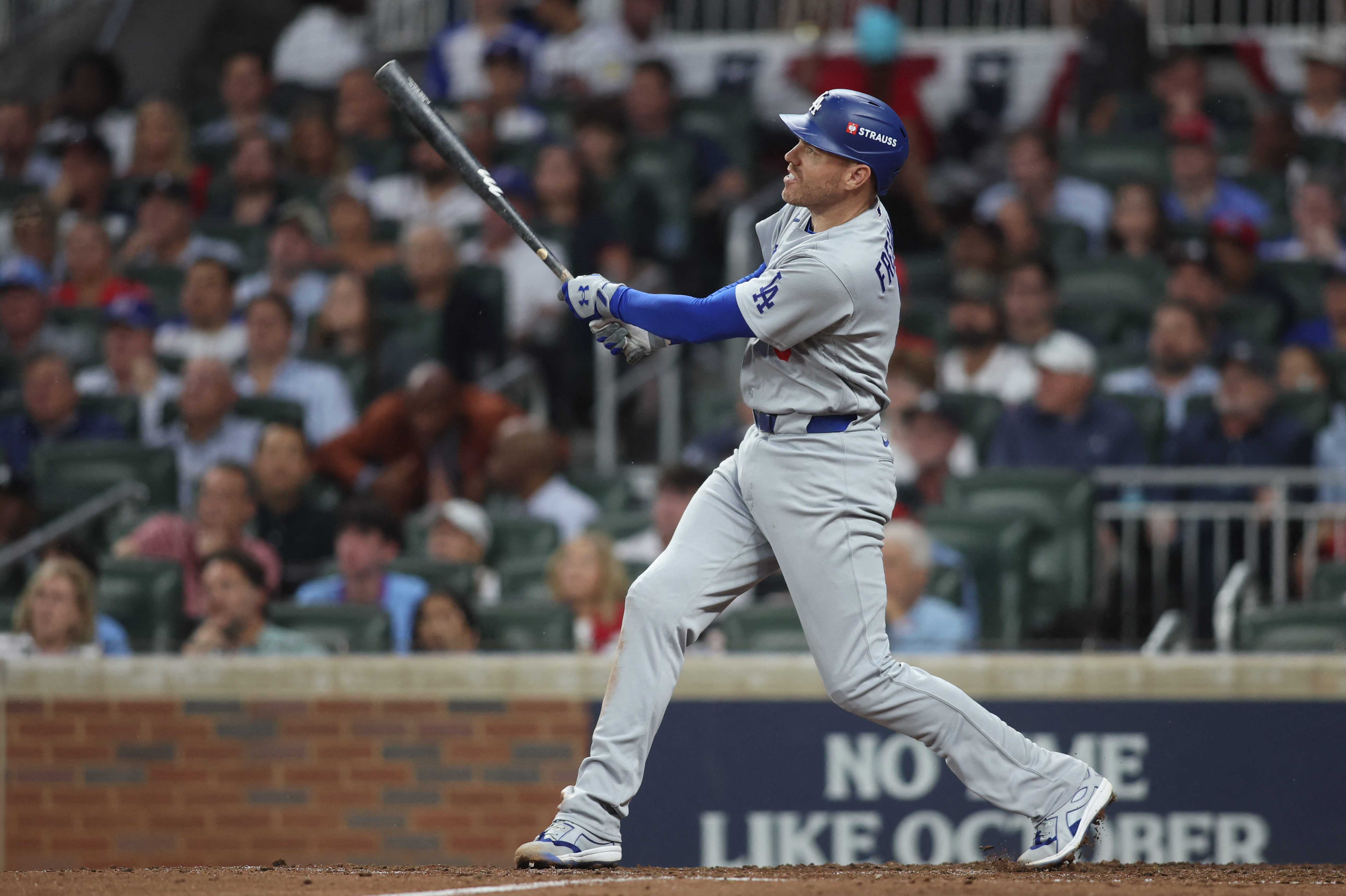 Los Angeles Dodgers first baseman Freddie Freeman (5) hits a solo home run as we make our best Brewers vs. Dodgers prediction. 