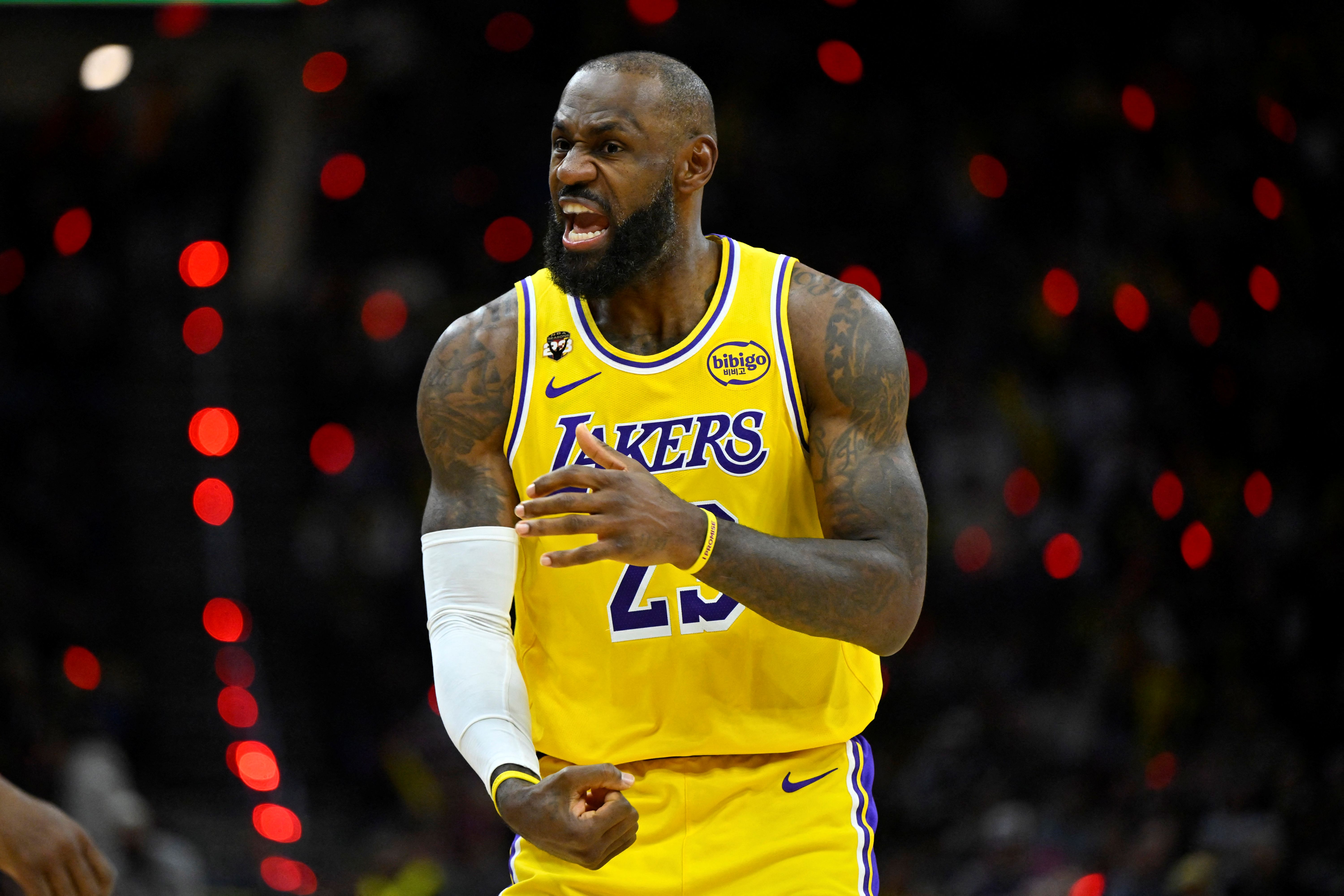 Los Angeles Lakers forward LeBron James (23), seen here reacting during a game, is featured in our NBA player props today.
