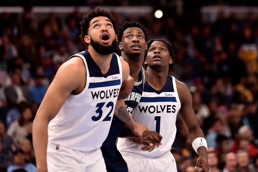 Karl-Anthony Towns of the Minnesota Timberwolves and Jaren Jackson Jr. of the Memphis Grizzlies battle for a rebound as we share our best Grizzlies vs. Timberwolves player props.
