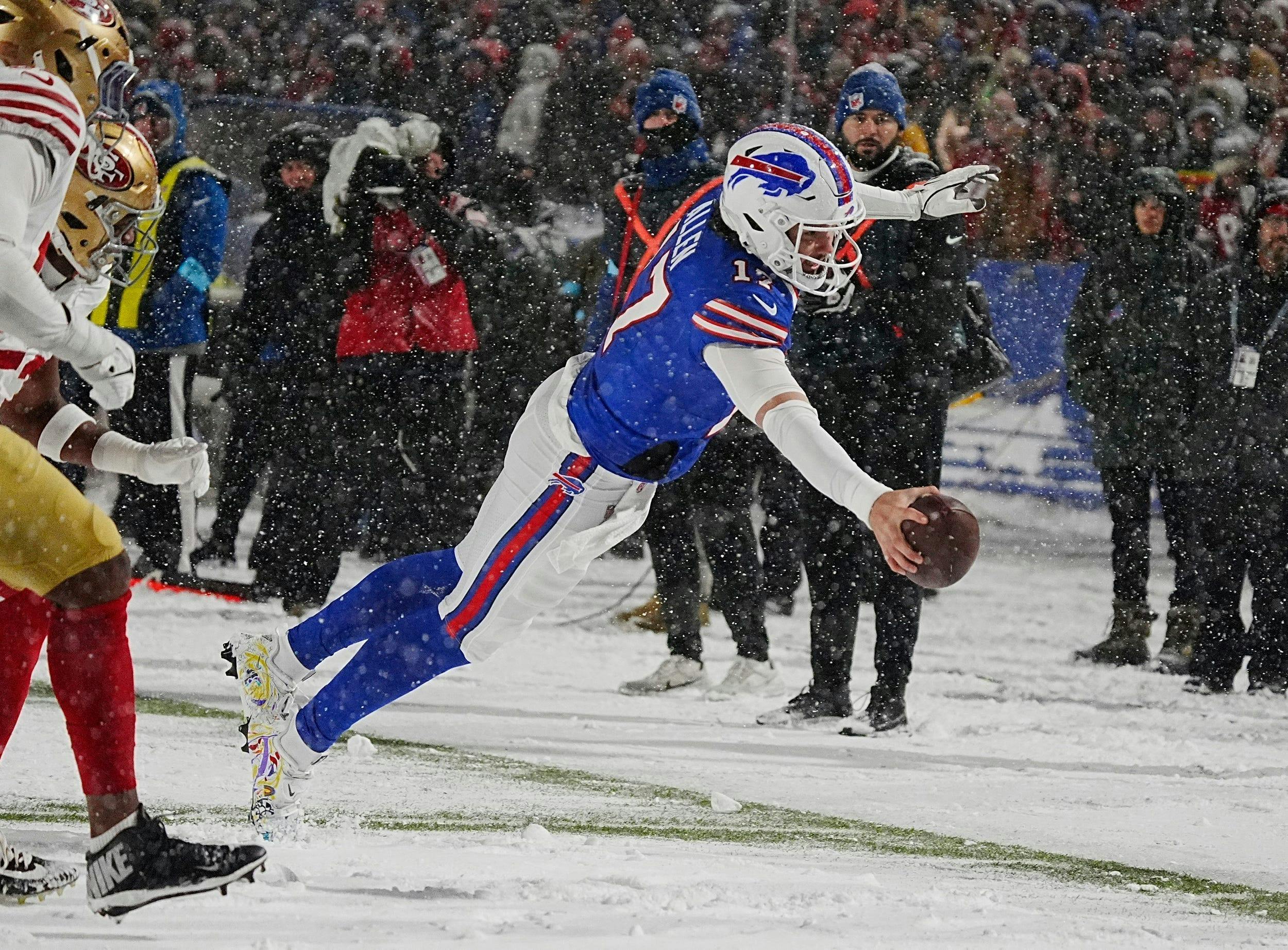 Bills Josh Allen leaps to the end zone as we examine the 2024-25 NFL MVP odds.