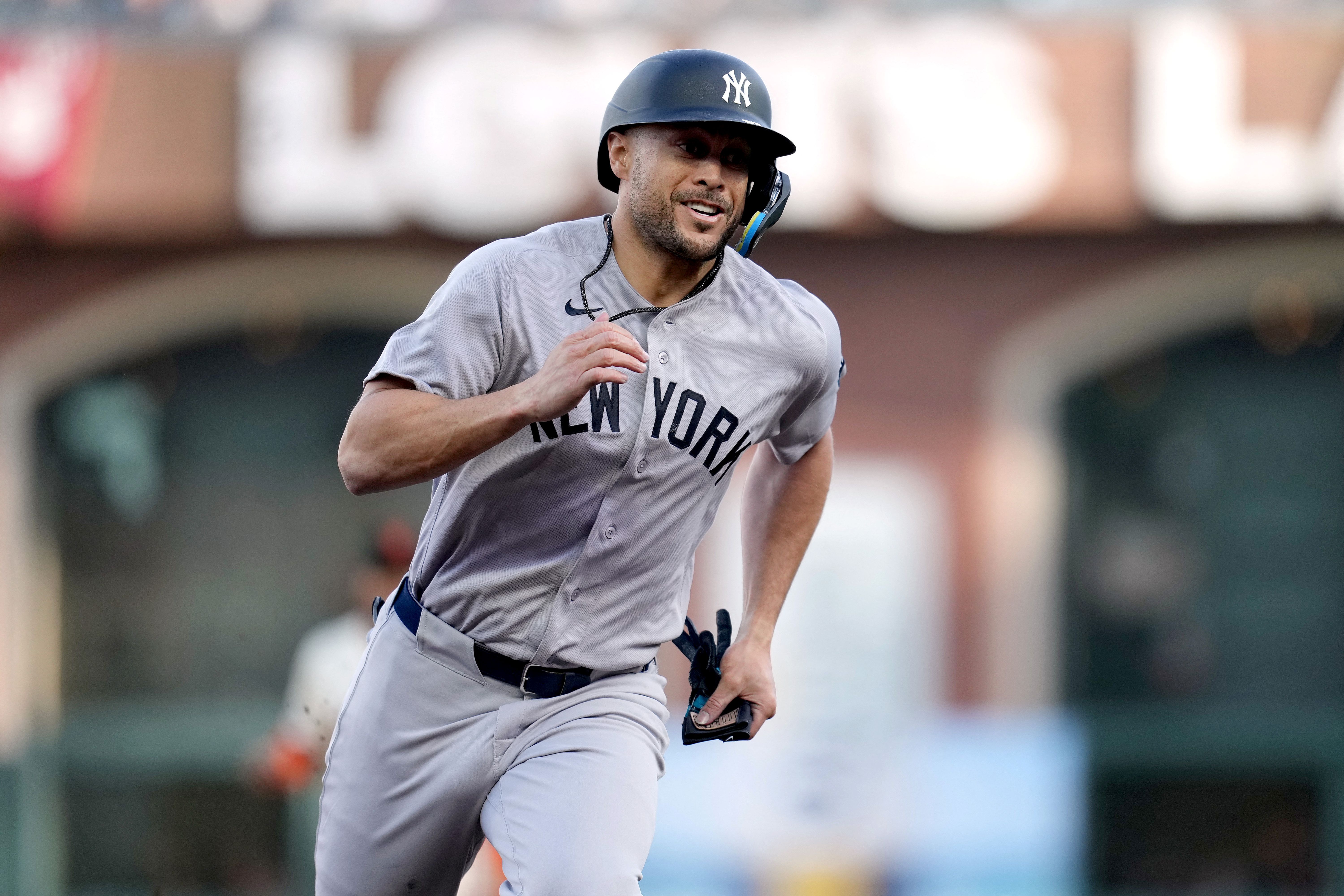 New York Yankees designated hitter Giancarlo Stanton prepares to round third base, and he's key as we look at our home run predictions today.